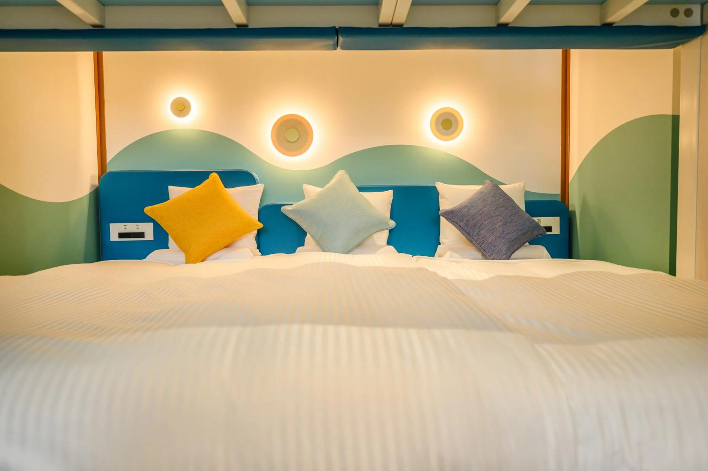 Bed in KAMENOI HOTEL Atami