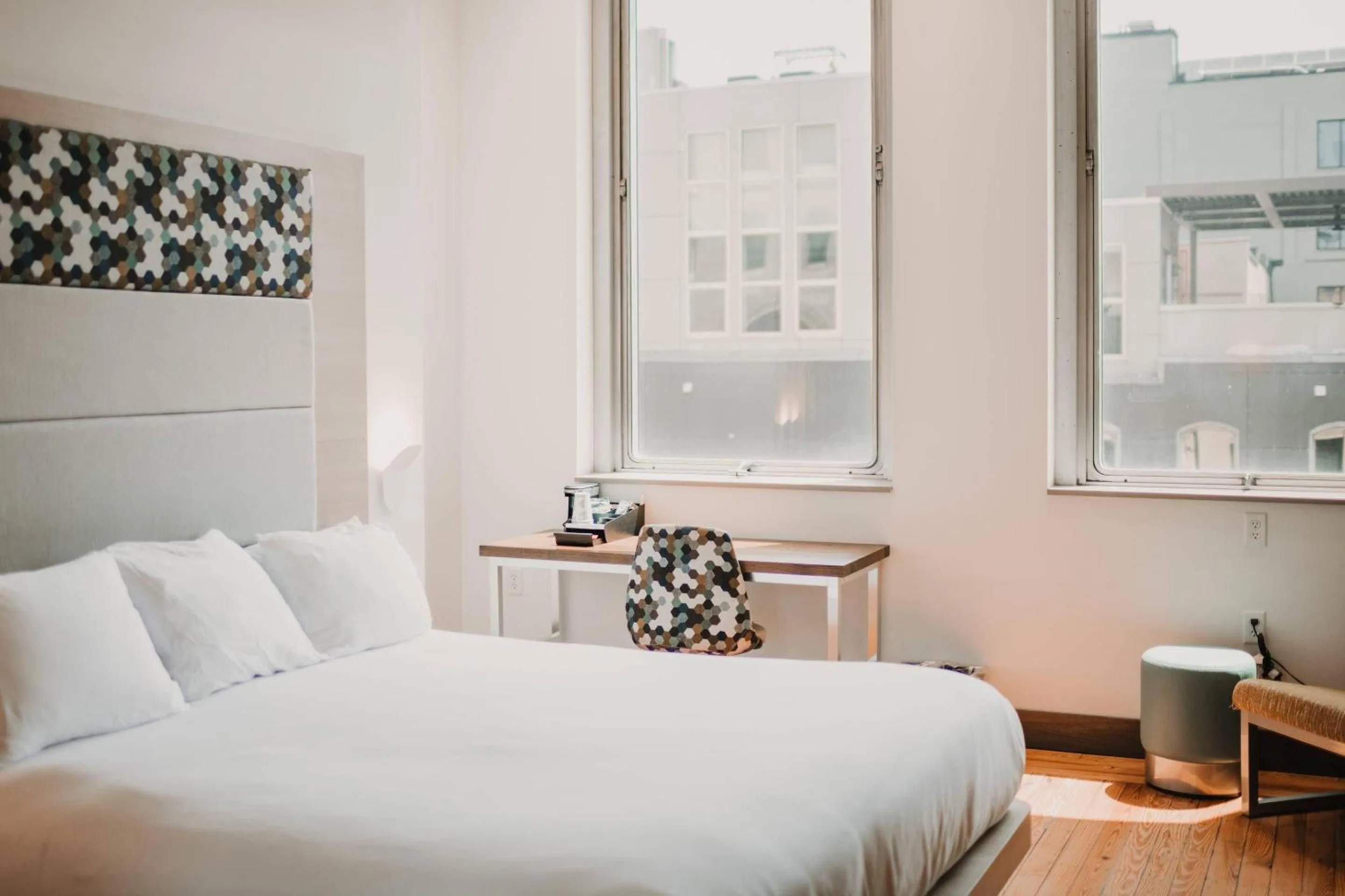 Bedroom, Bed in CityFlatsHotel - Grand Rapids, an Ascend Collection Hotel