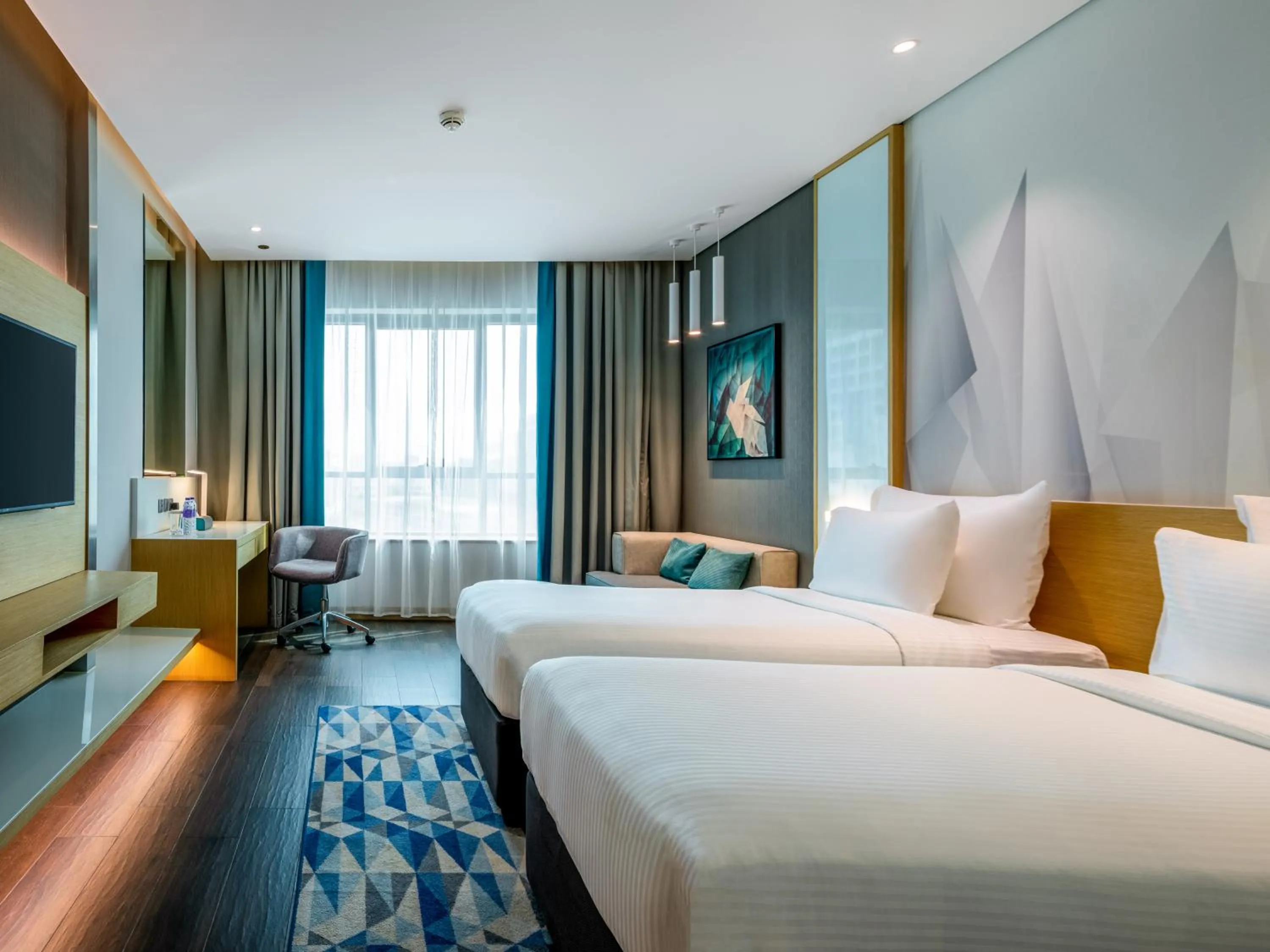 Bed in Flora Inn Hotel Dubai Airport