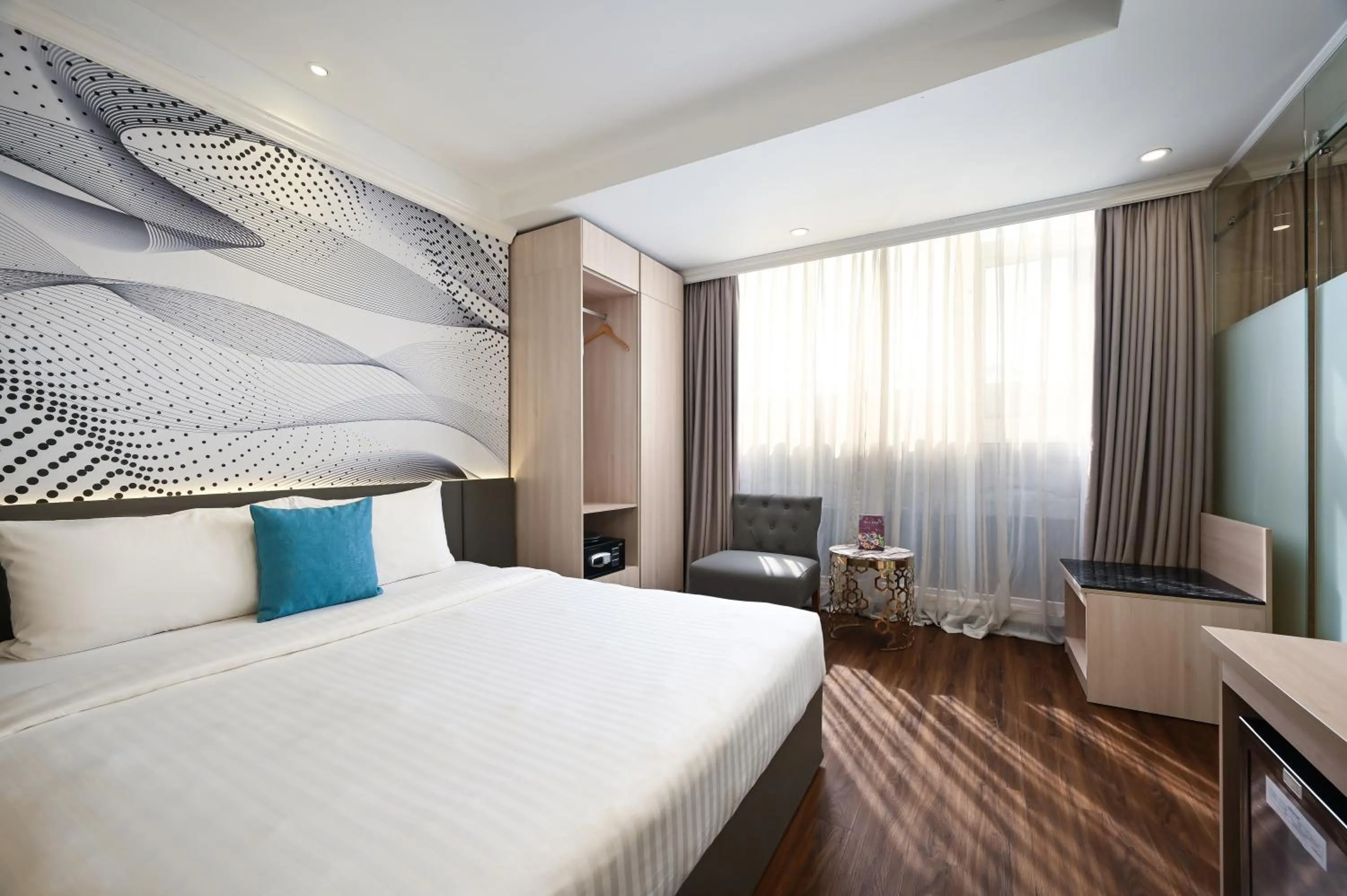 Seating area, Bed in Cicilia Saigon Center