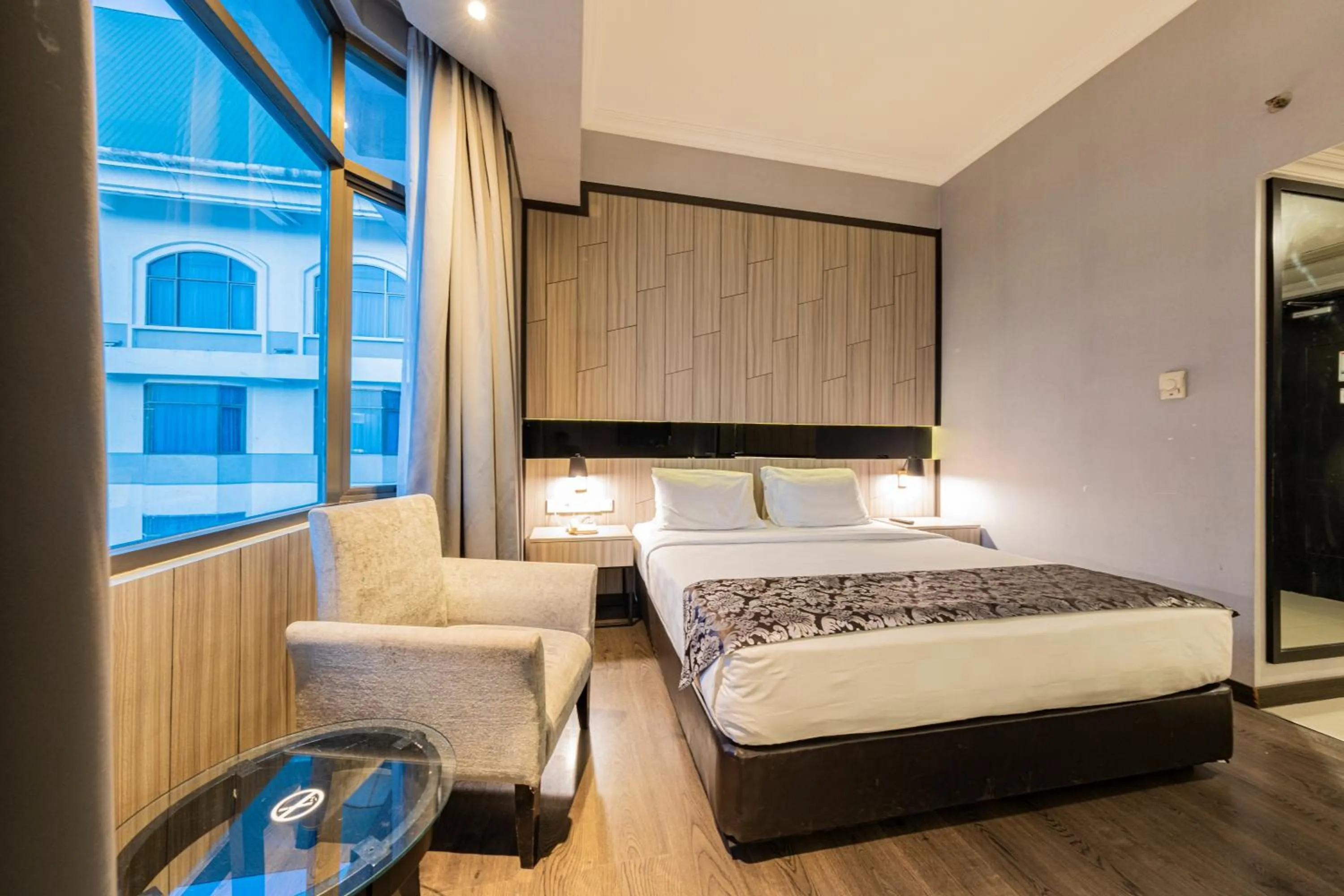 Seating area, Bed in Grand Jatra Hotel Pekanbaru