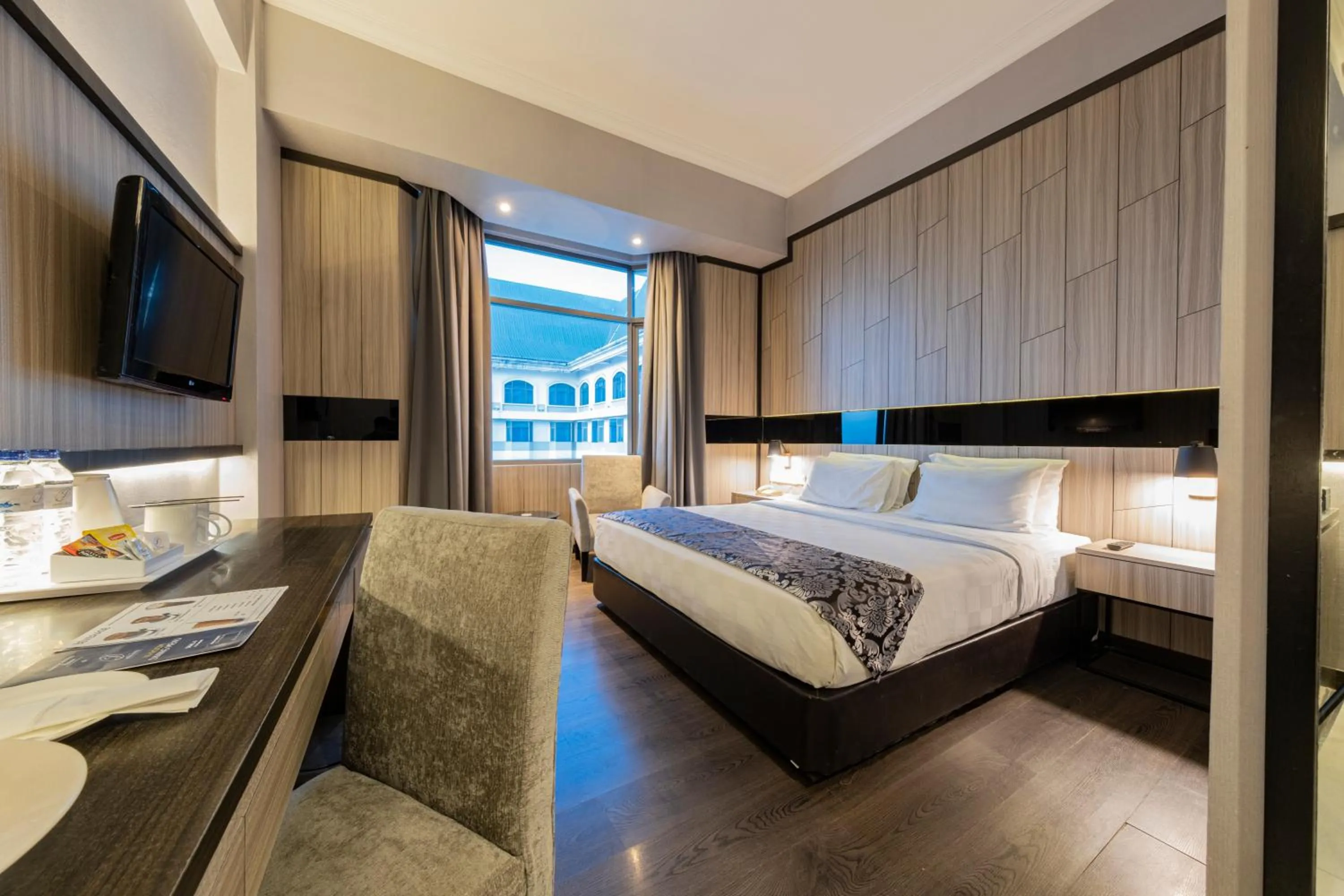 Coffee/tea facilities, Bed in Grand Jatra Hotel Pekanbaru