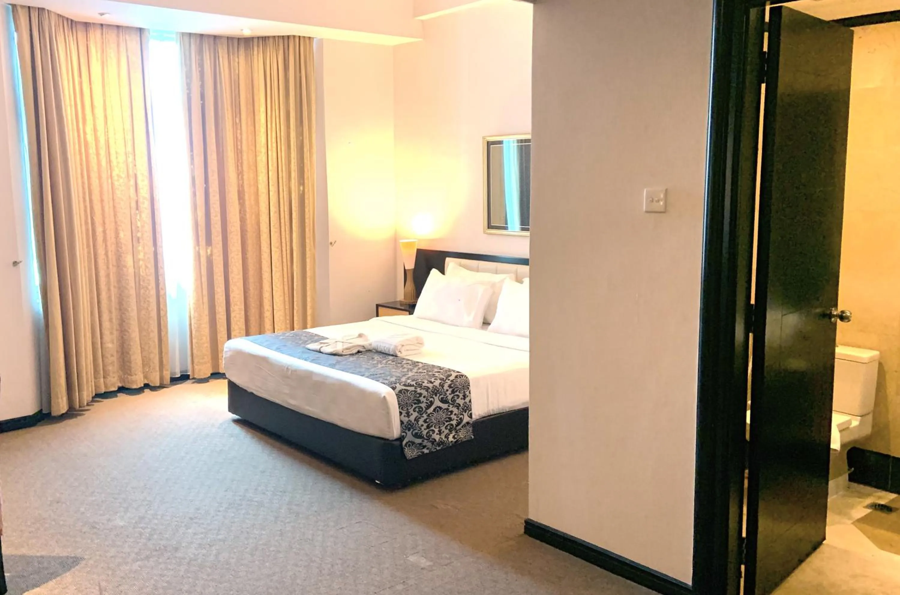 Bed in Grand Jatra Hotel Pekanbaru