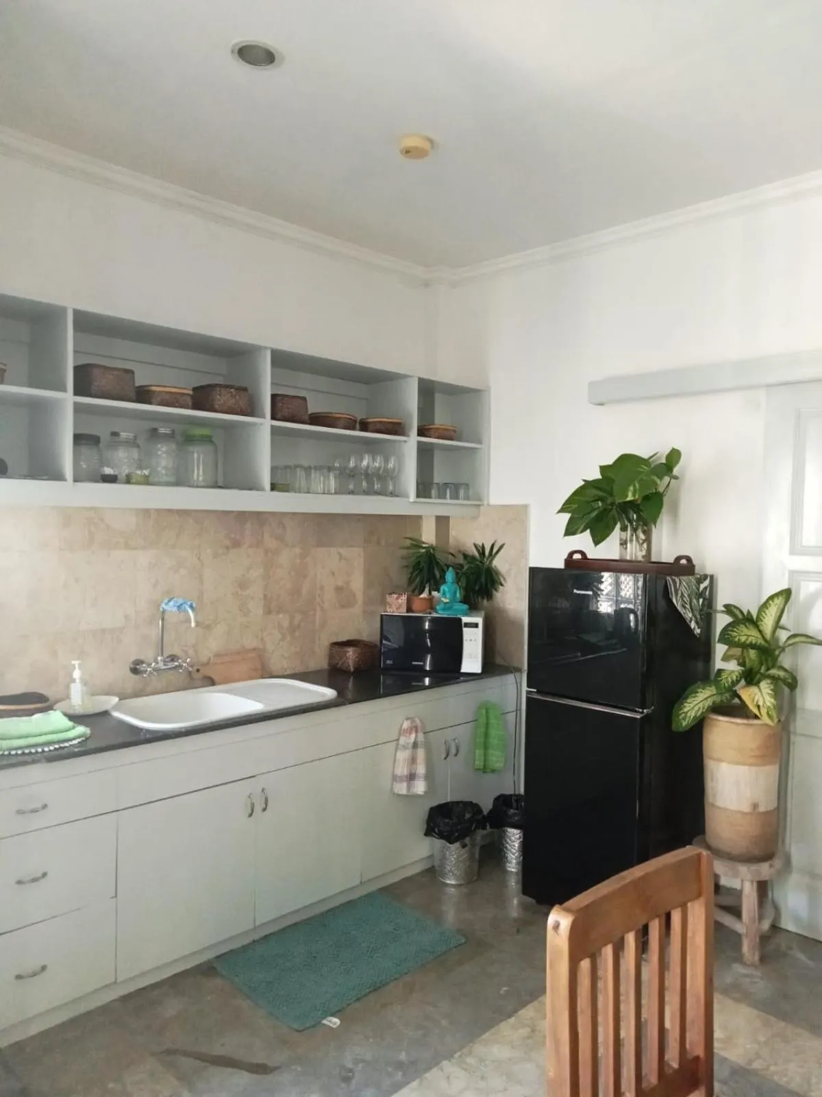 Kitchen or kitchenette in Bali Court Hotel & Apartment