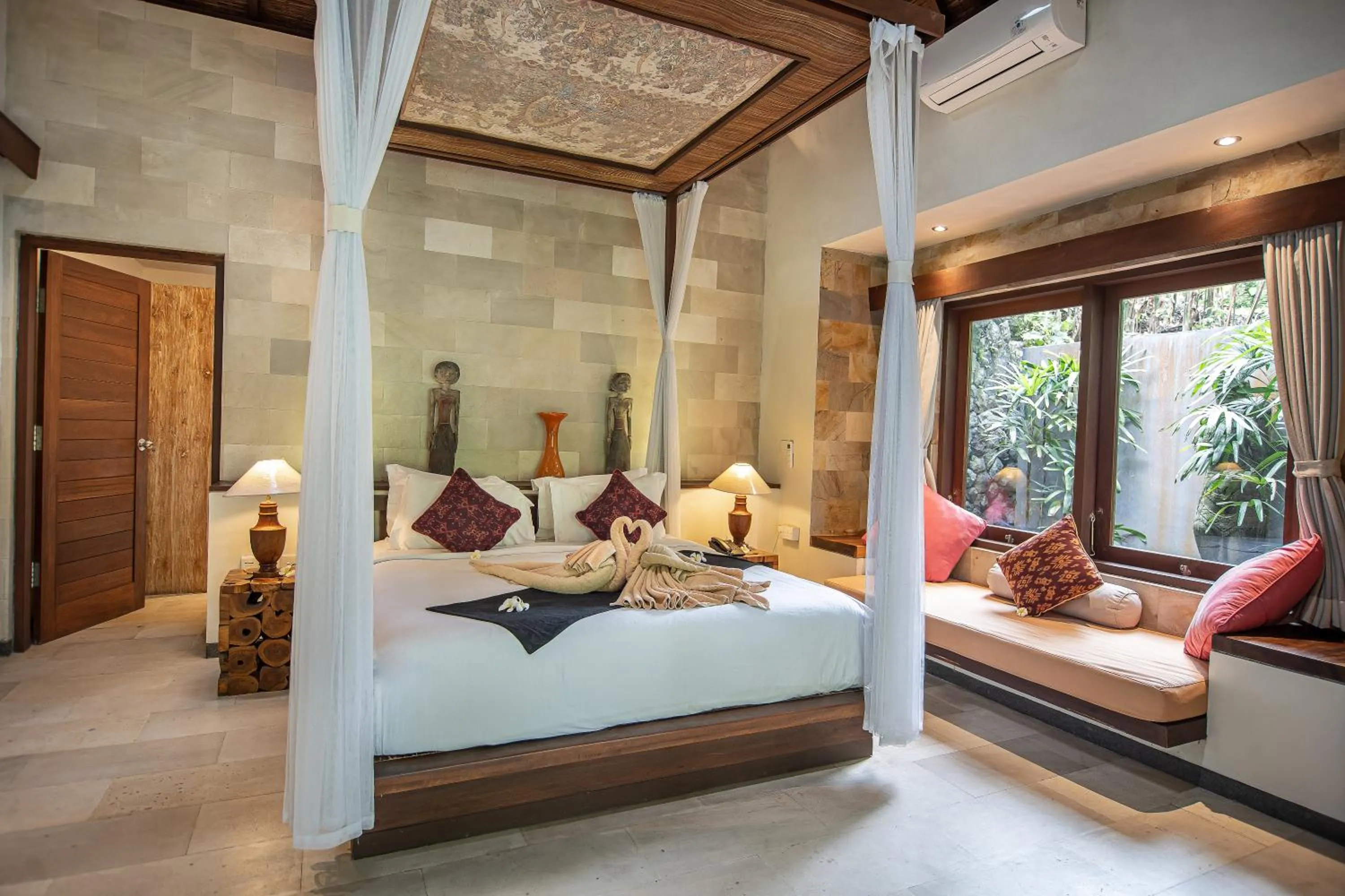 Bed in D'Legon Villas