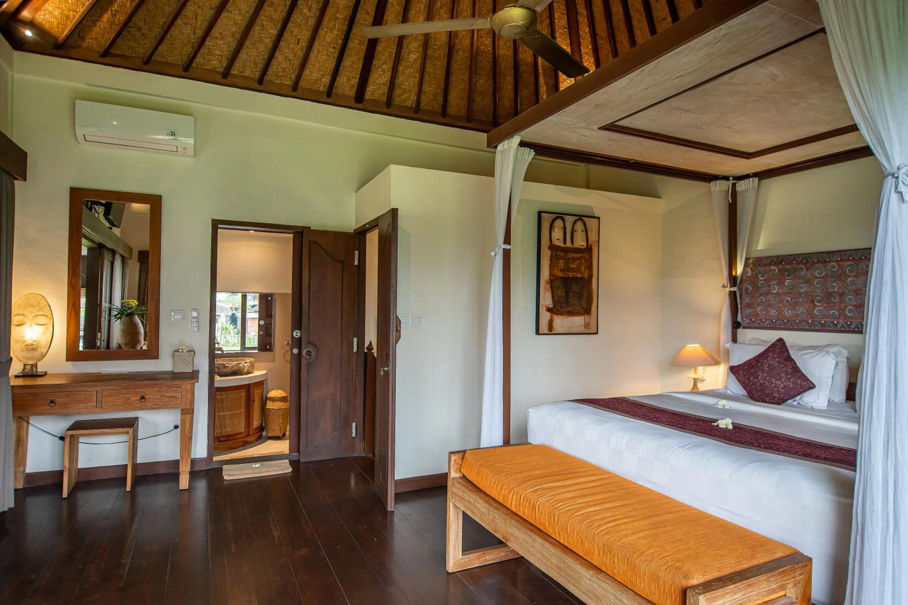 Bed in D'Legon Villas