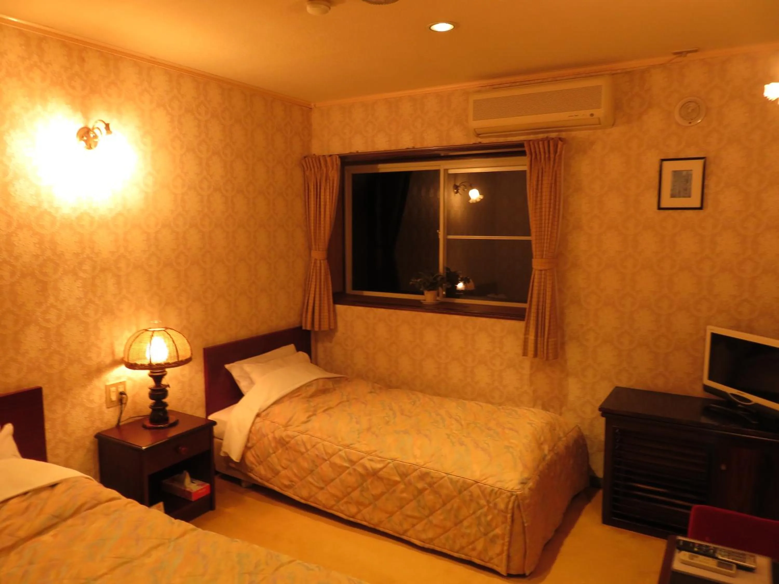 Photo of the whole room, Bed in Nikko Pension L'escale