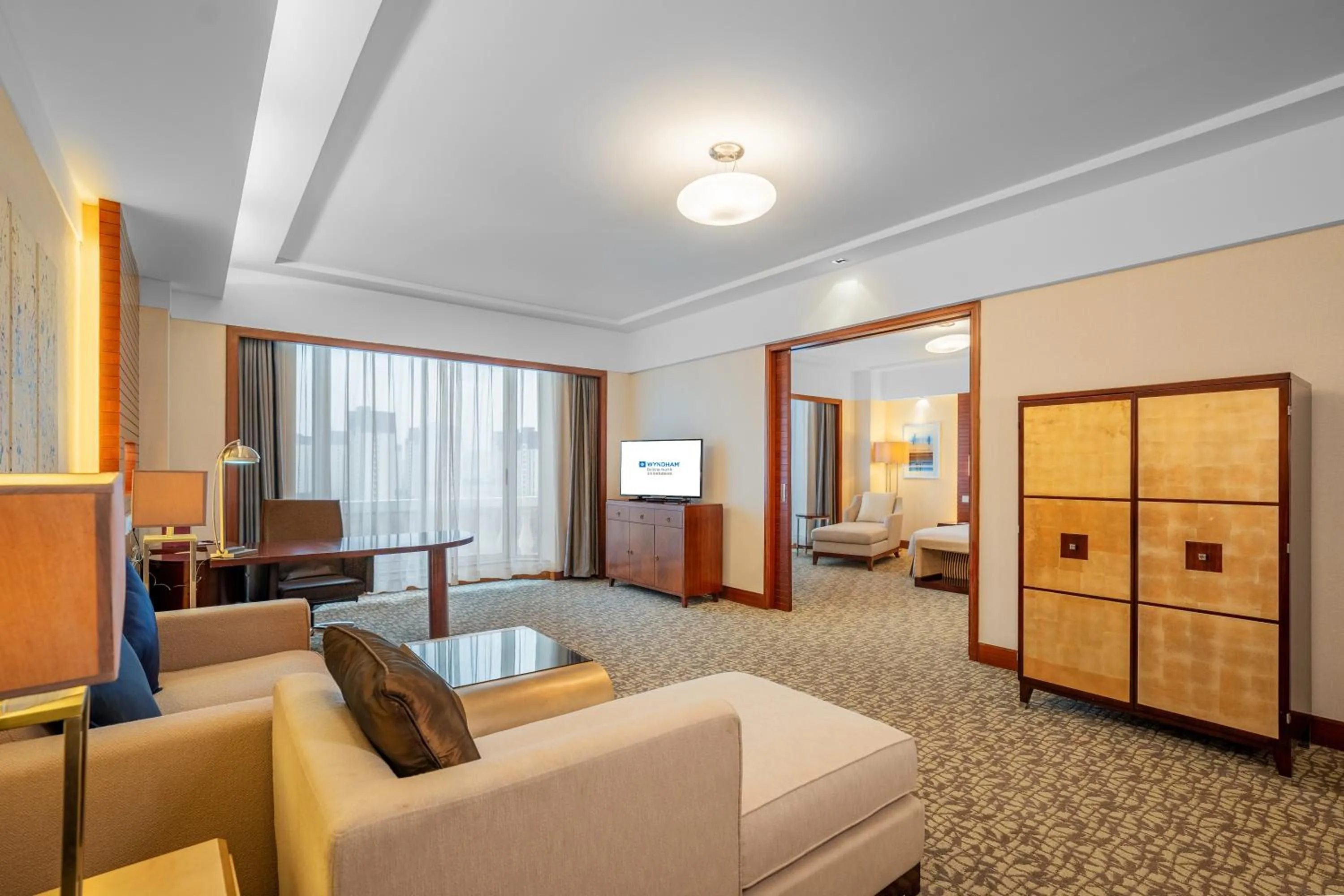 Living room, Bed in Ramada Beijing North