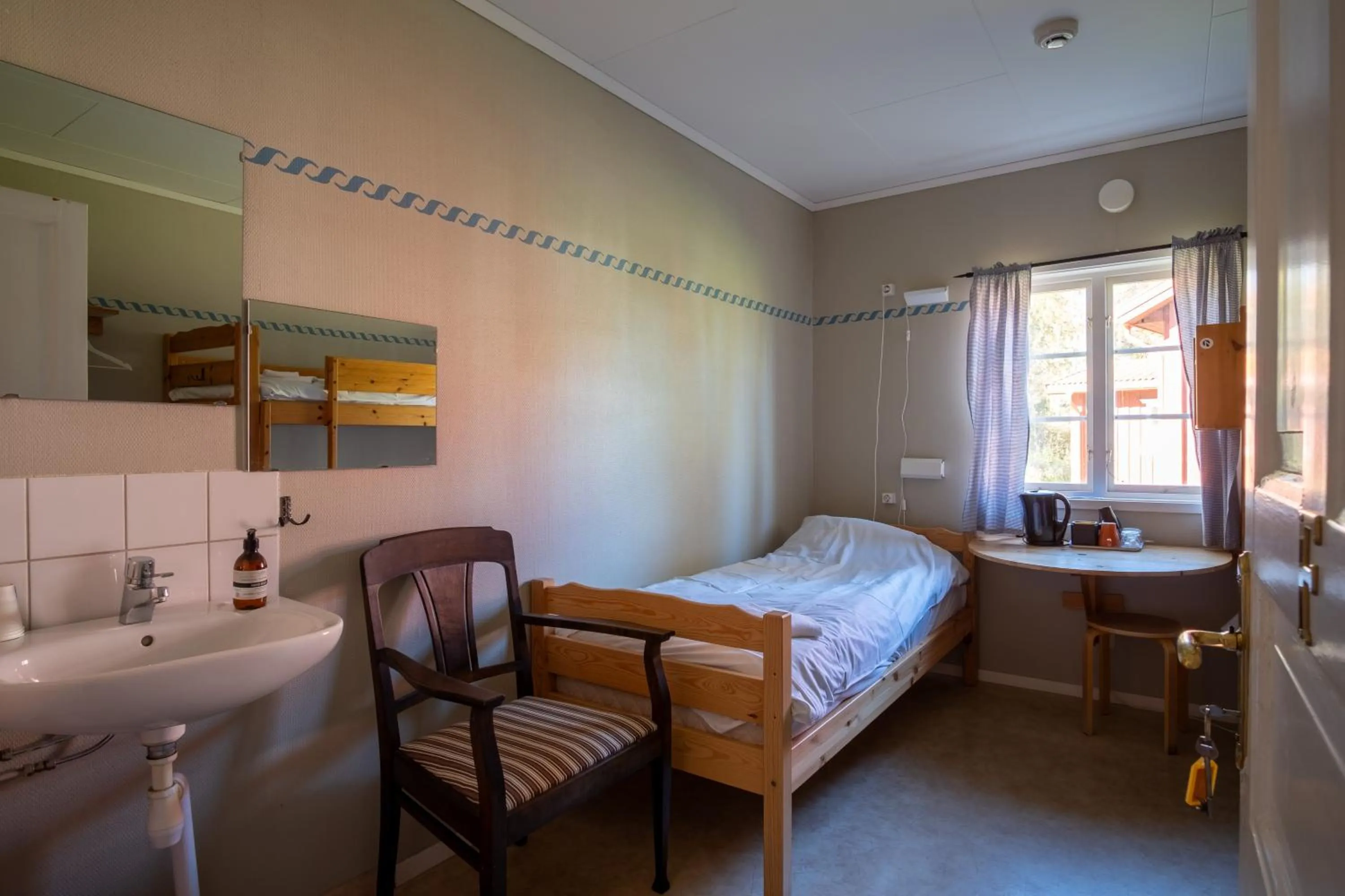 Bed in Sunne Hembygdsgård B&B