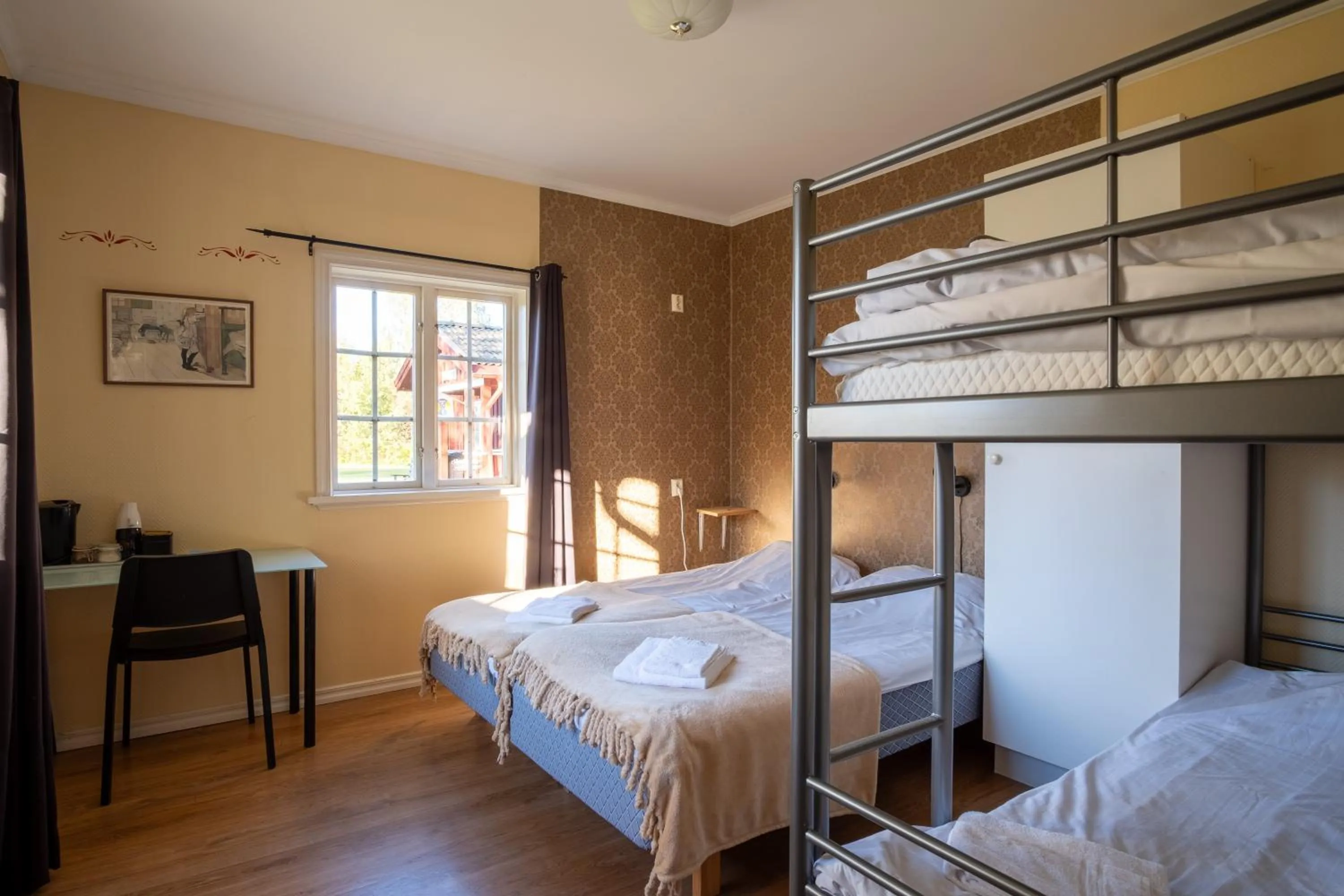 Bed in Sunne Hembygdsgård B&B