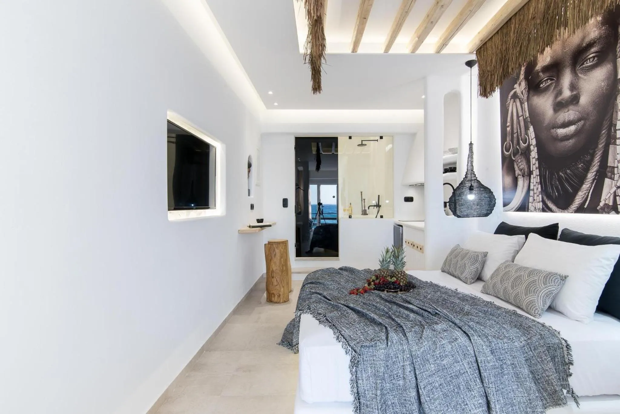 Bed in Portara Seaside Luxury Suites