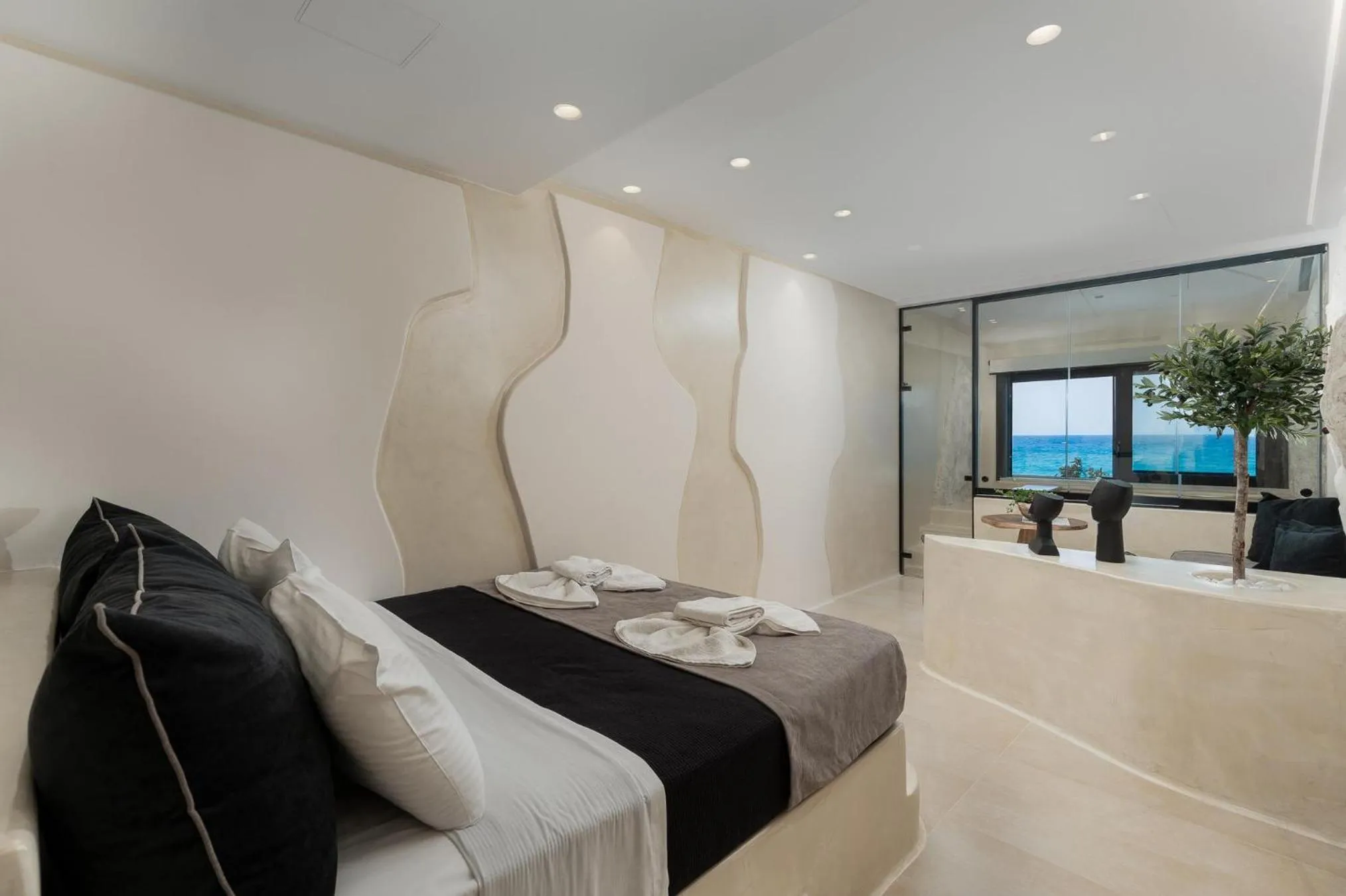 Bed in Portara Seaside Luxury Suites