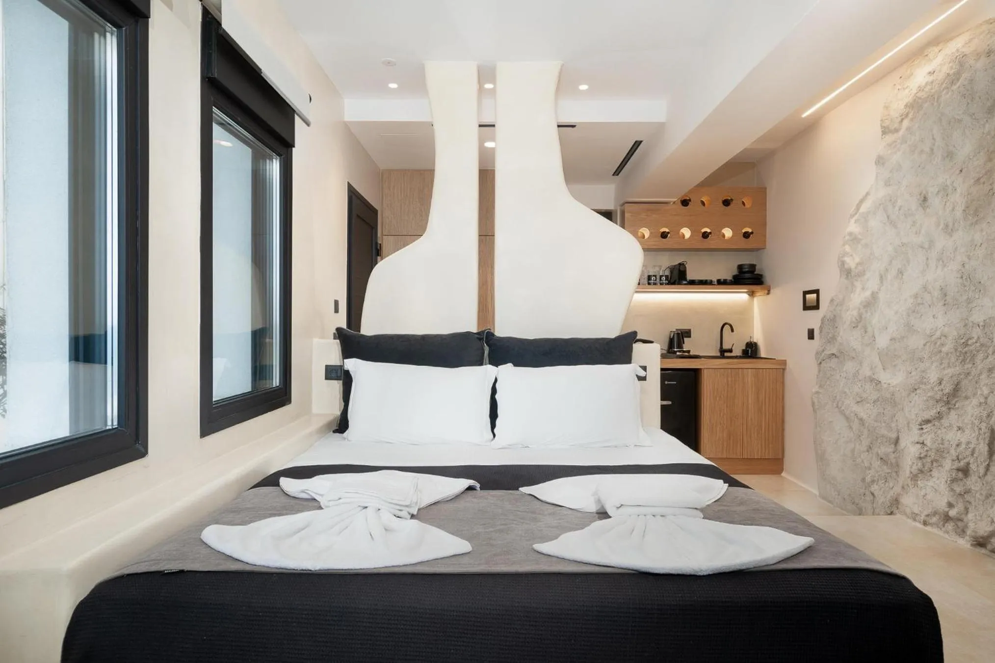 Bed in Portara Seaside Luxury Suites