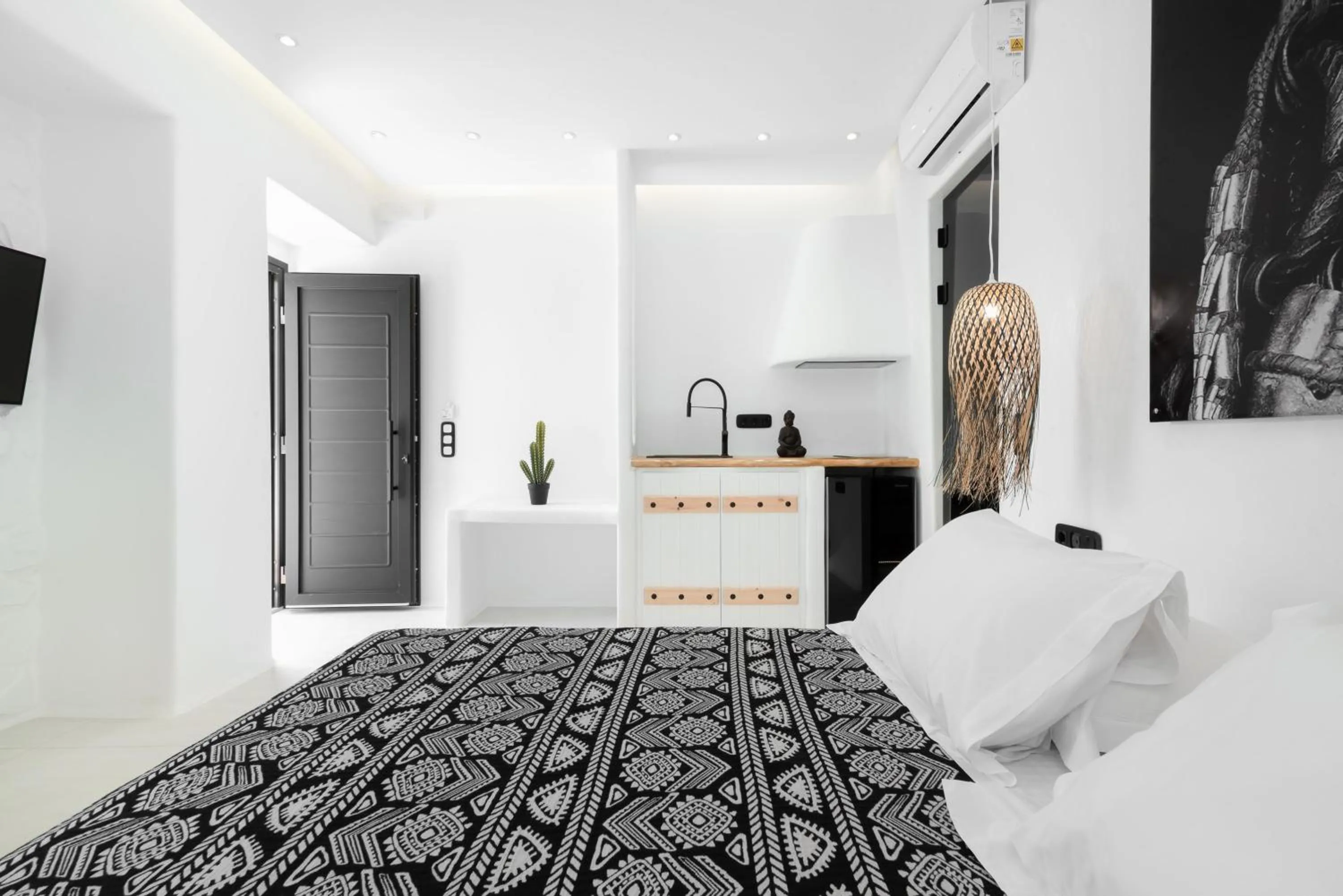 Bed in Portara Seaside Luxury Suites