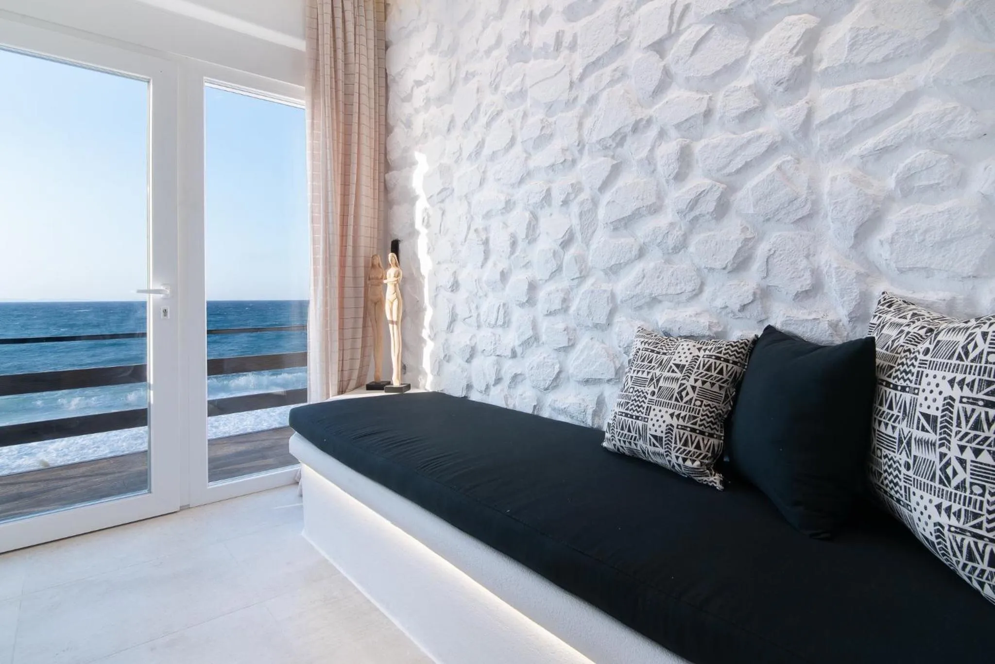 Living room, Bed in Portara Seaside Luxury Suites