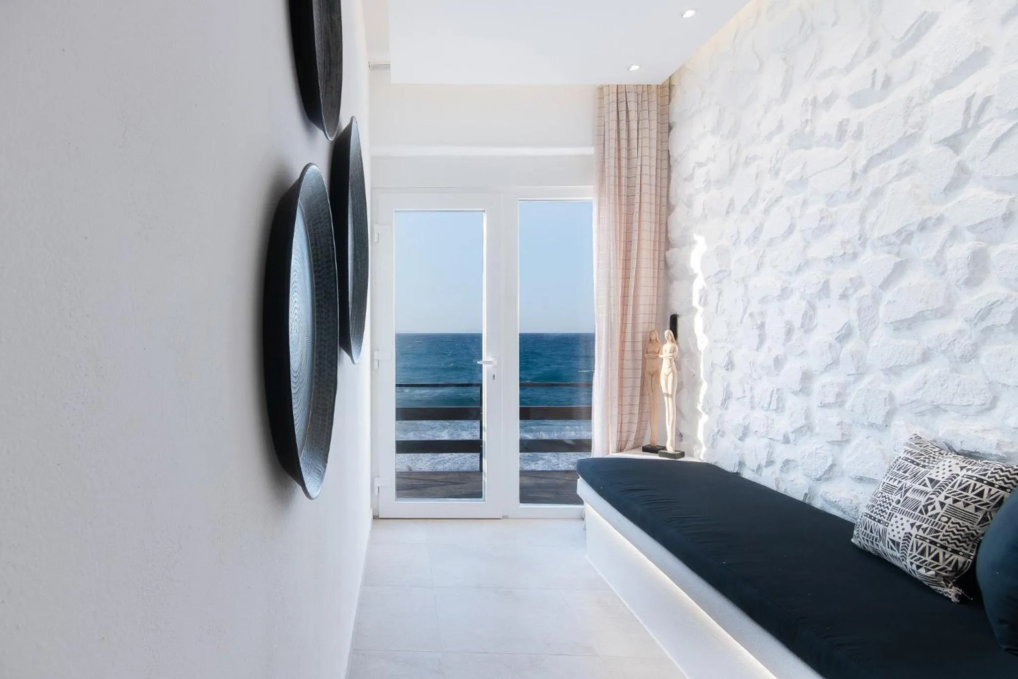 Bed in Portara Seaside Luxury Suites