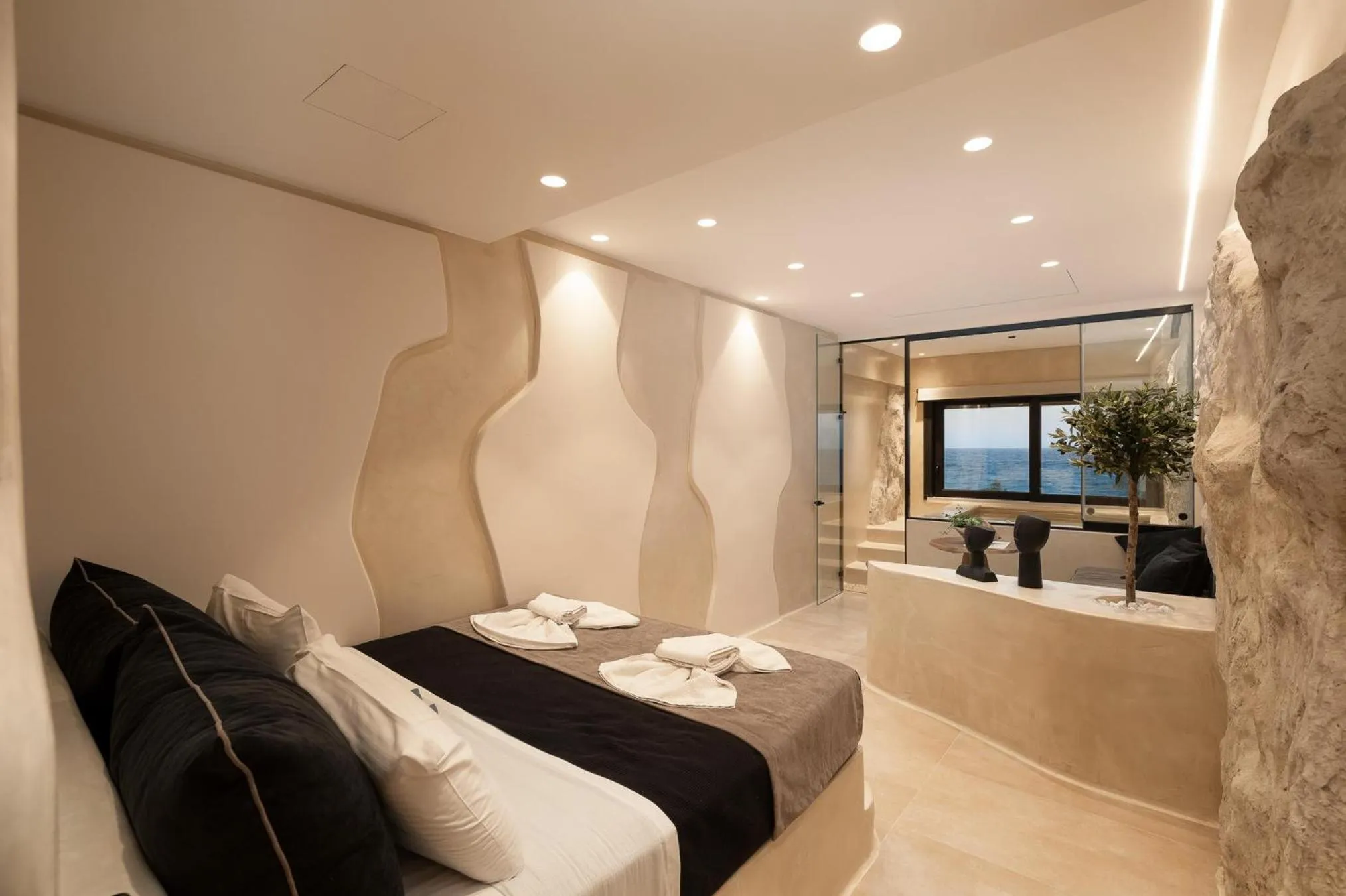 Bed in Portara Seaside Luxury Suites