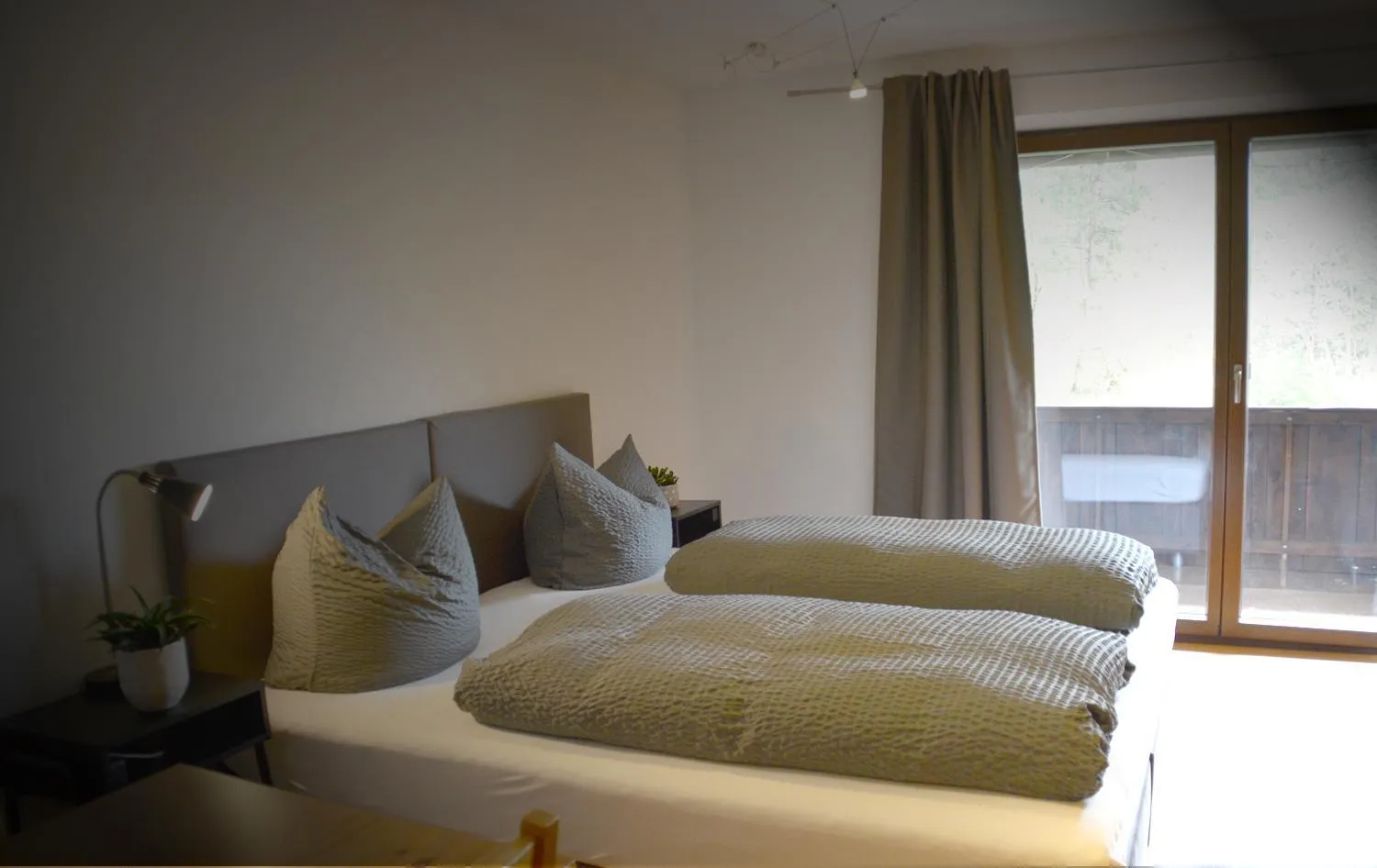 Bed in Pension Almhof Baumgarten