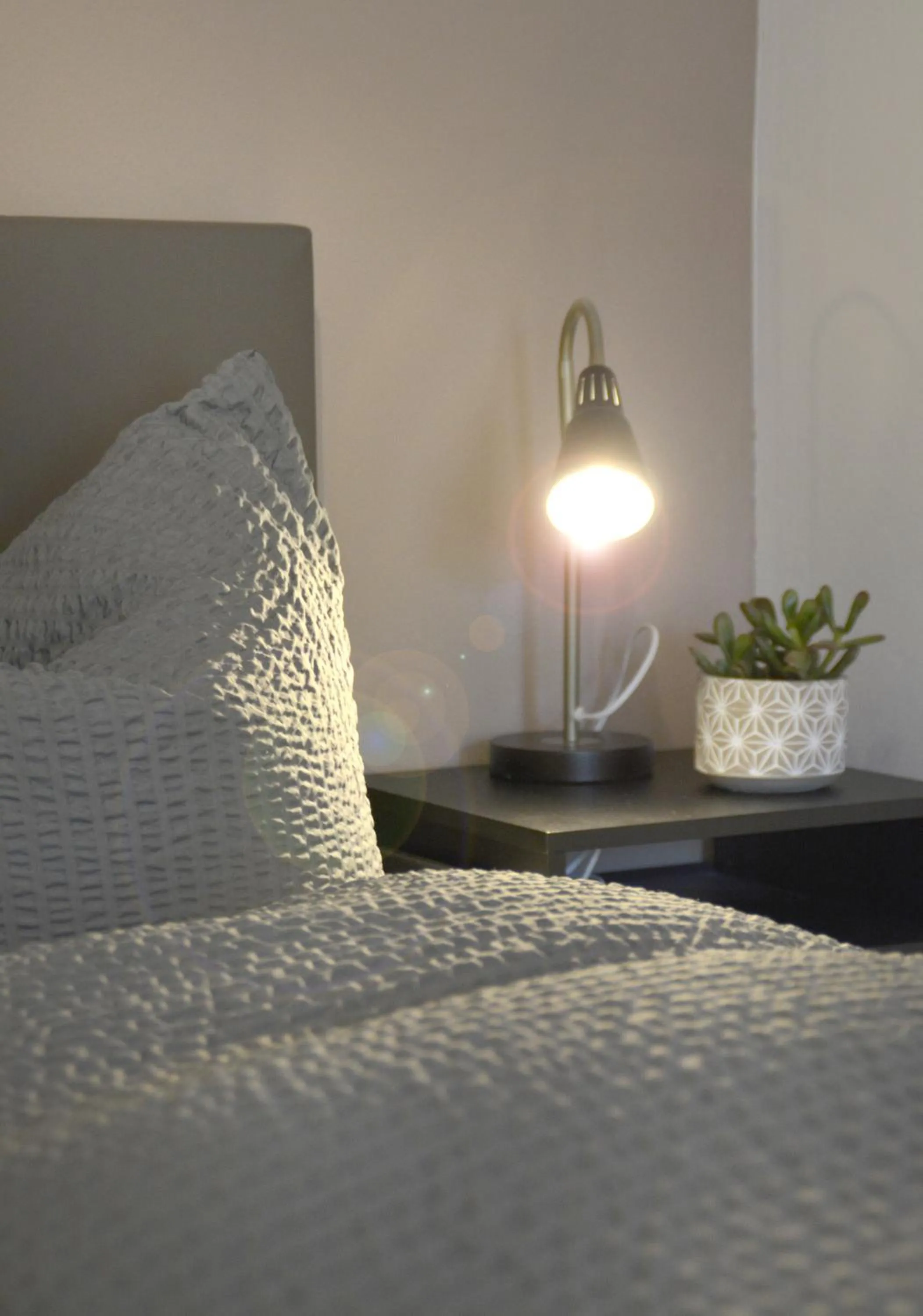 Bed in Pension Almhof Baumgarten