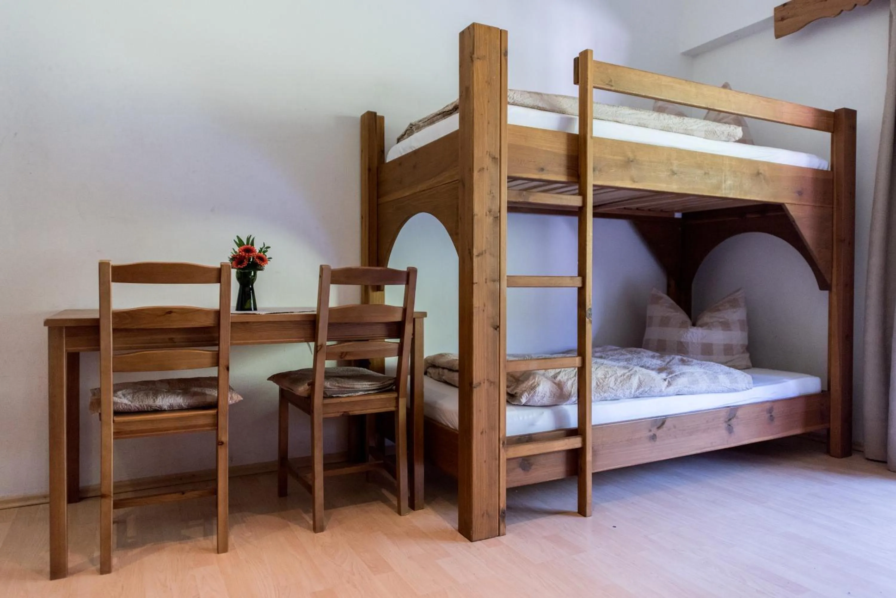 Bed in Pension Almhof Baumgarten