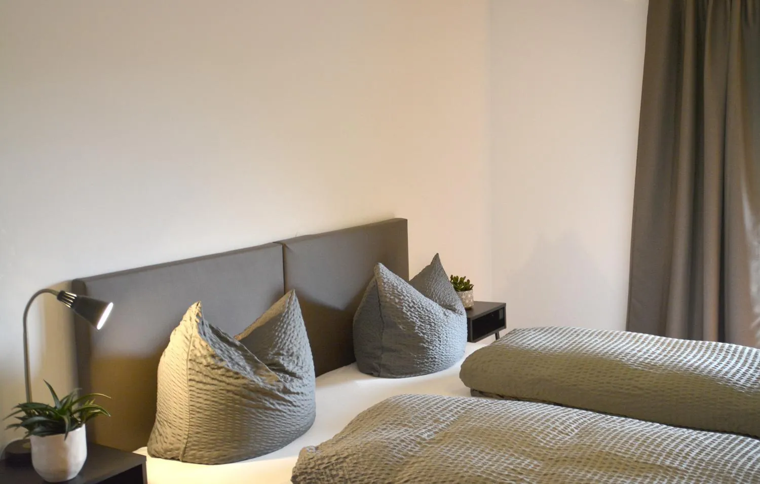 Bed in Pension Almhof Baumgarten