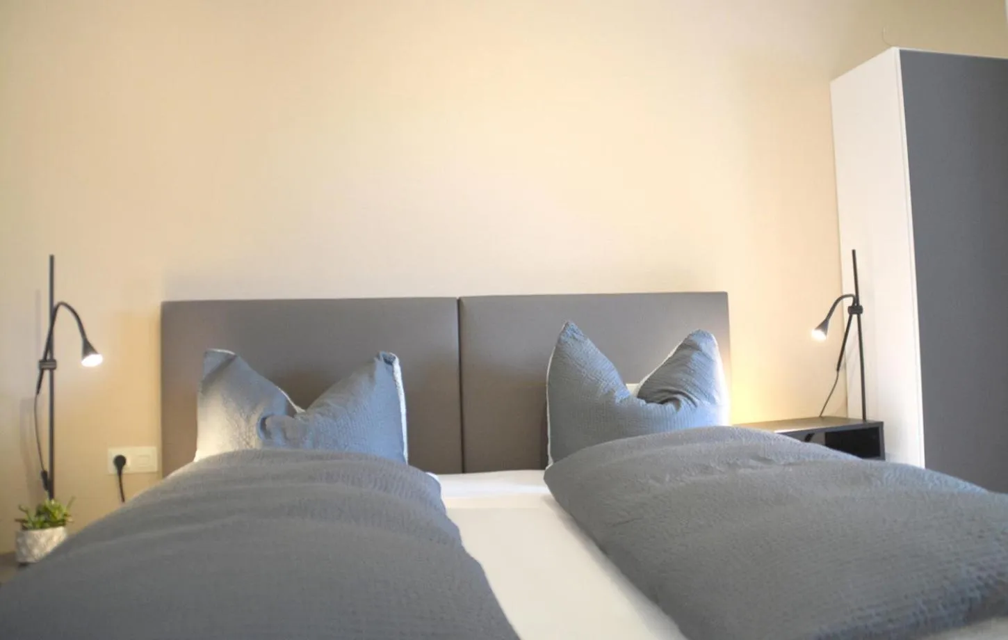 Bed in Pension Almhof Baumgarten