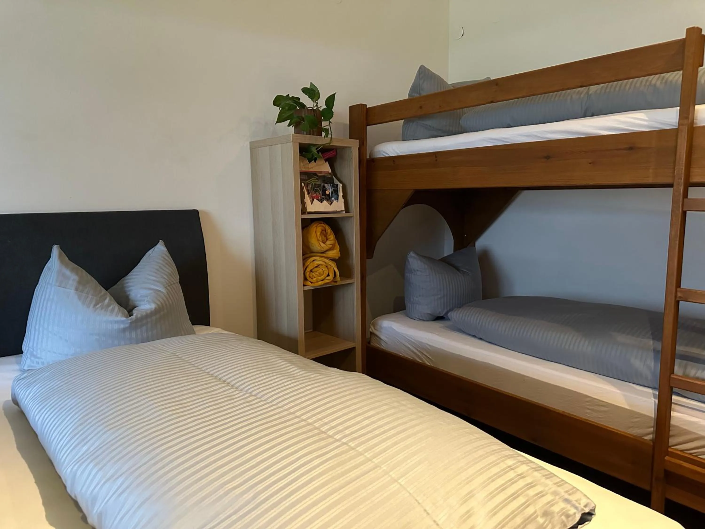 Bed in Pension Almhof Baumgarten