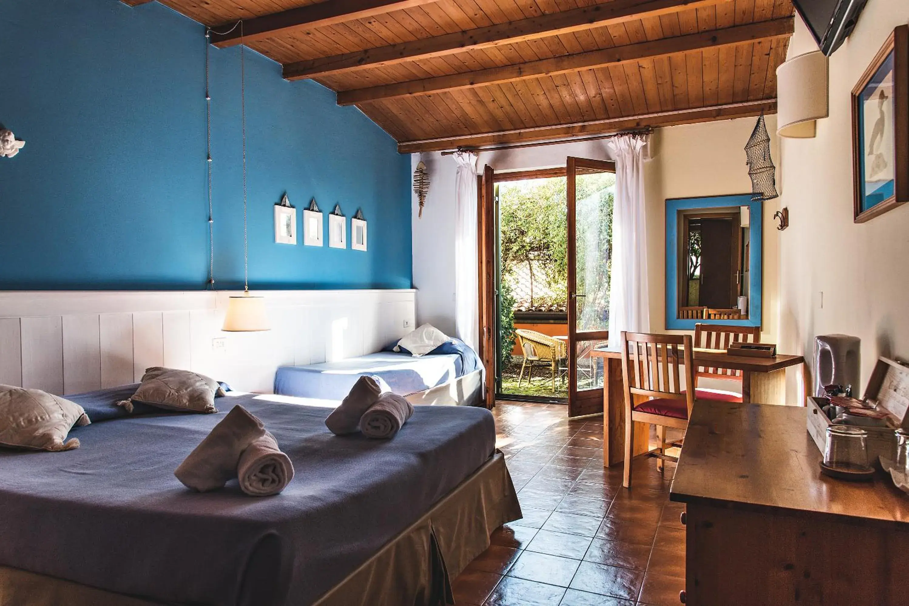 Standard Triple Room with Private Garden - single occupancy in Corte San Mattia Standard Triple Room with Private Garden - single occupancy in Corte San Mattia