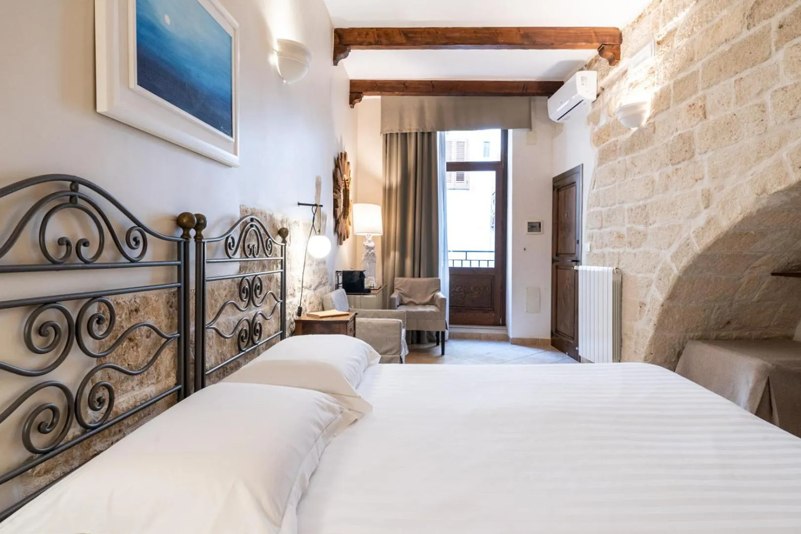 Bed in Santo Stefano Home & Breakfast