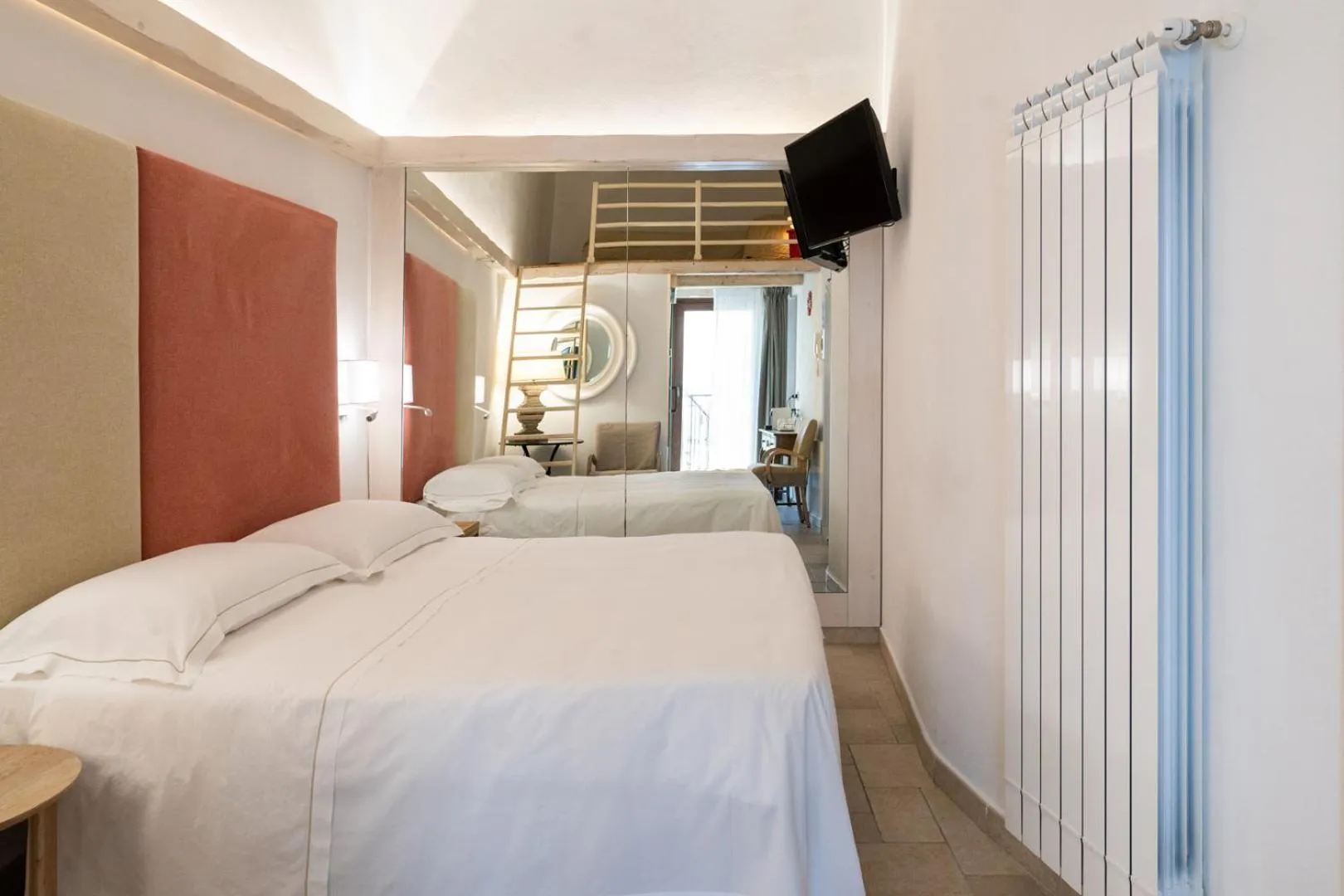 Bed in Santo Stefano Home & Breakfast