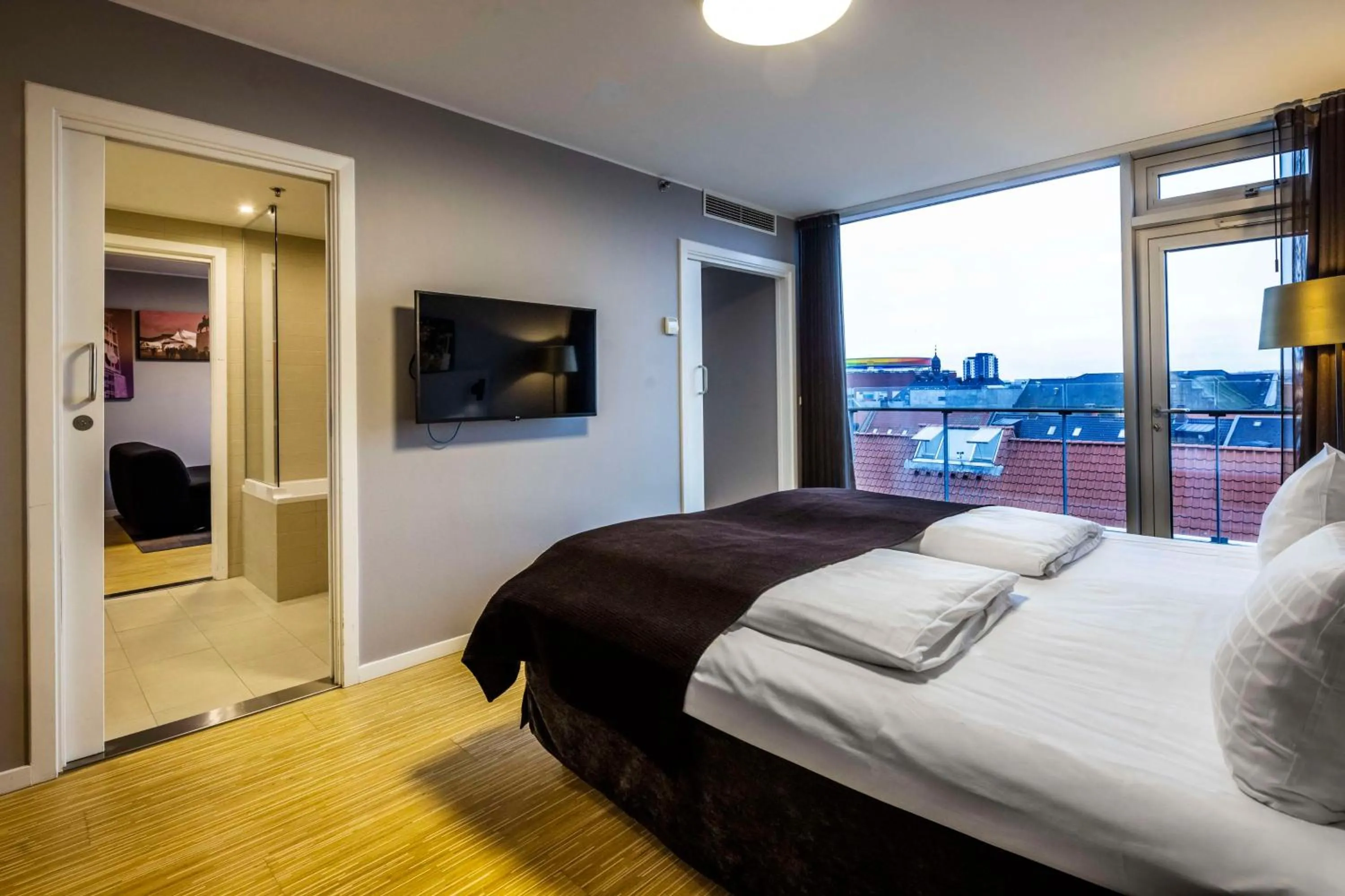 Photo of the whole room, Bed in Scandic Aarhus City