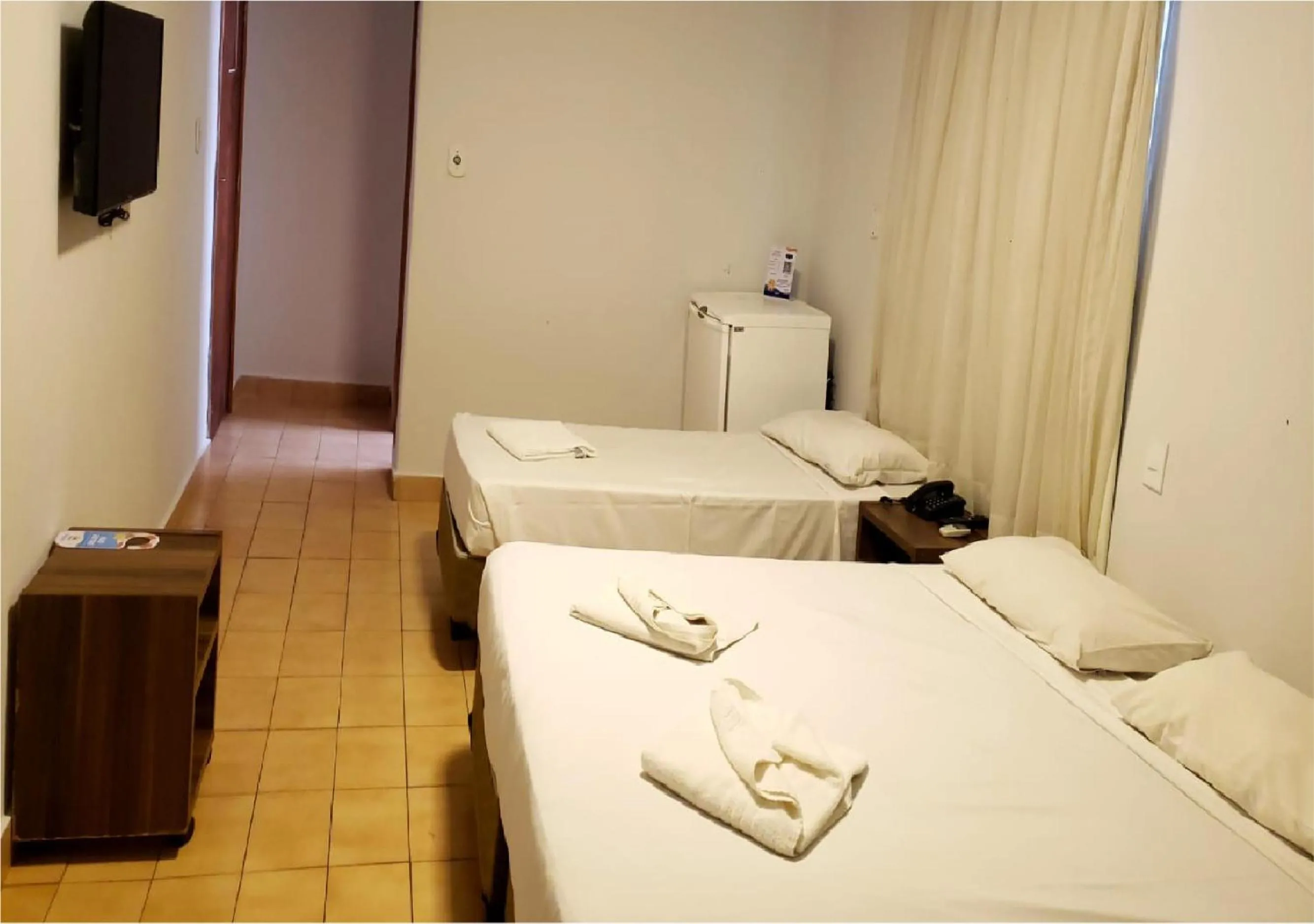Bed in Pousada das Aguas