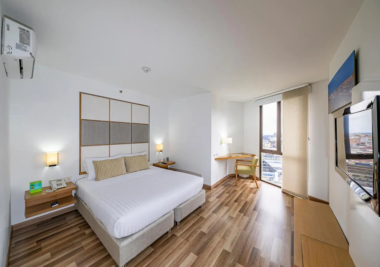 Photo of the whole room in Hotel Cosmos Cali