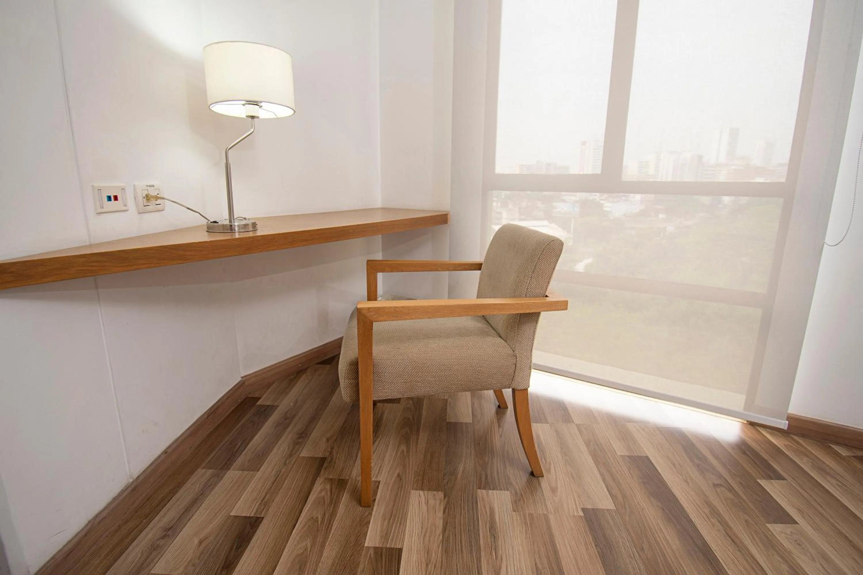 Seating area in Hotel Cosmos Cali