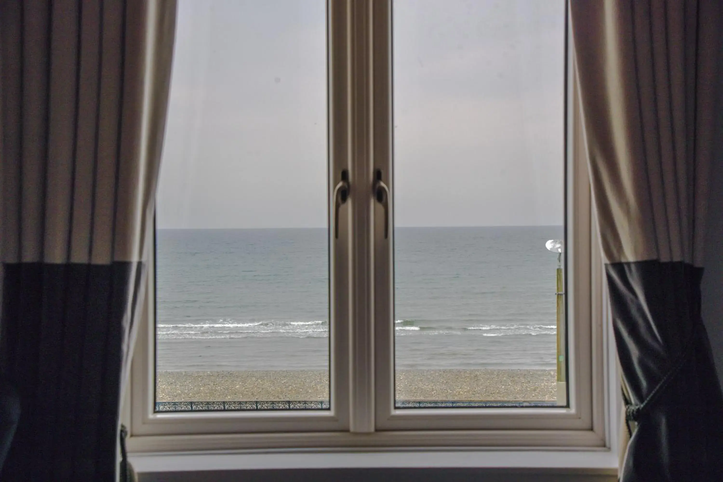 Sea view in The Strand Hotel, the former residence of Oscar Wilde Sea view in The Strand Hotel, the former residence of Oscar Wilde