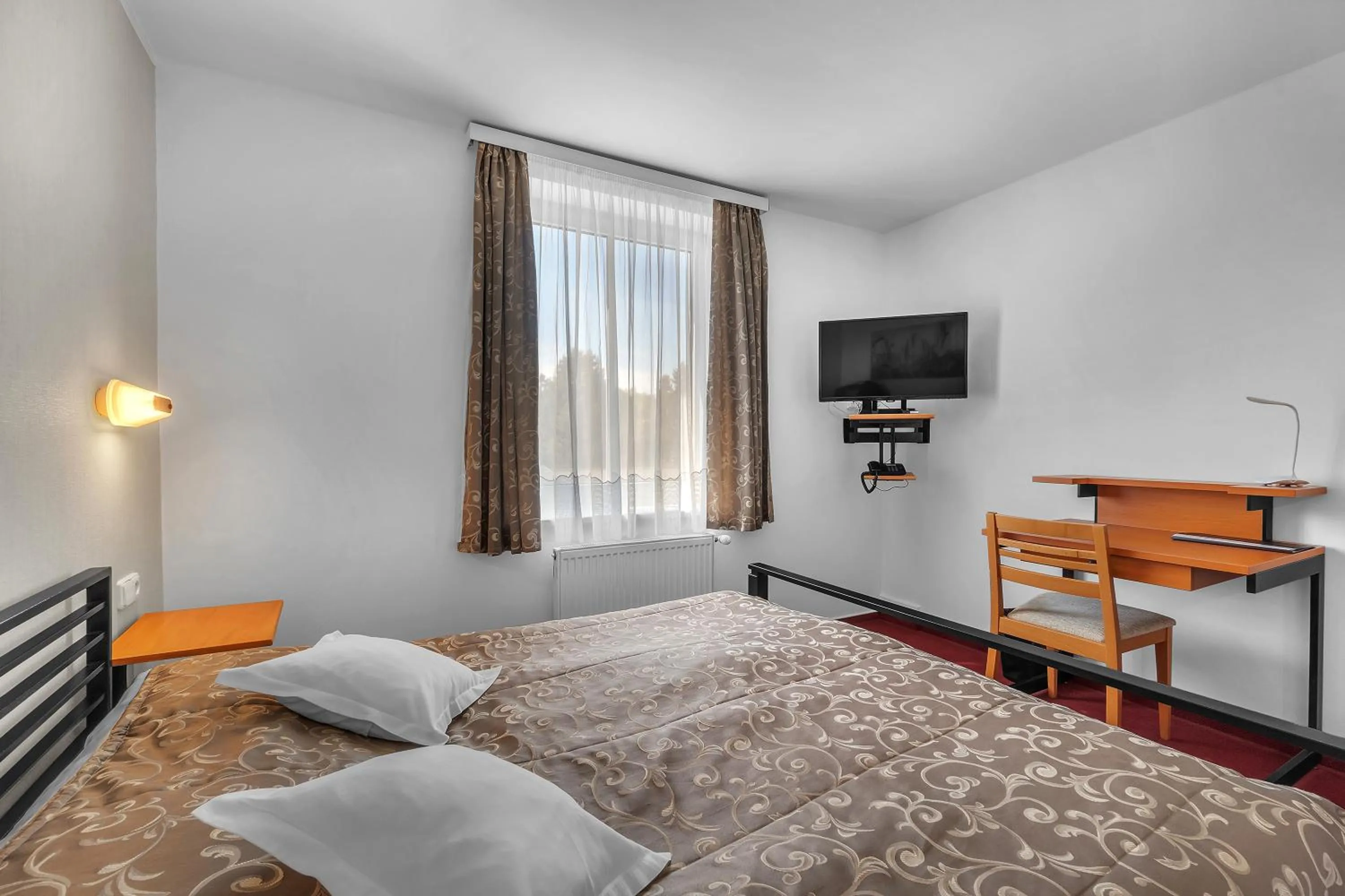 Bed in Hotel Za Vodou