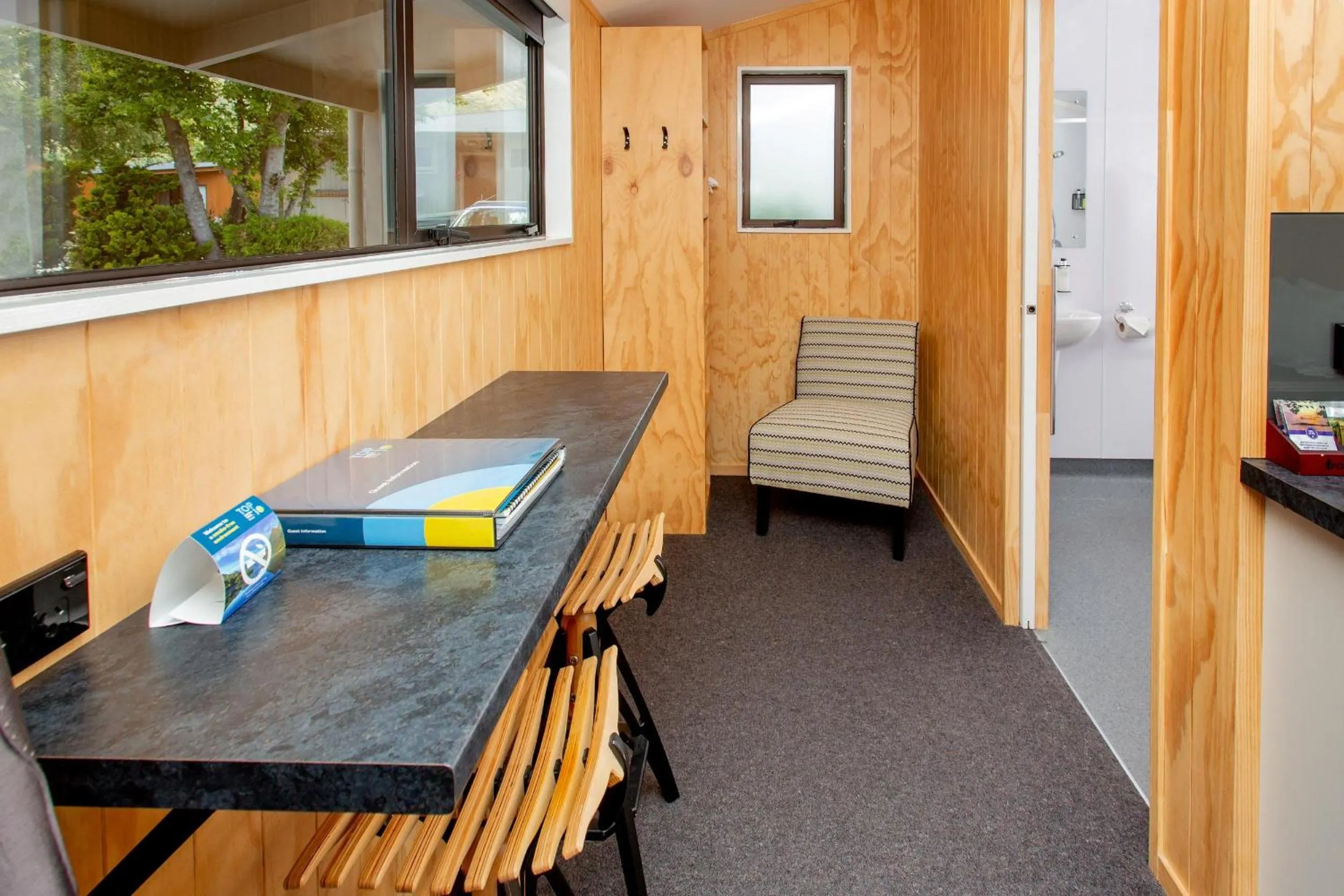 Seating area in Queenstown Top 10 Holiday Park