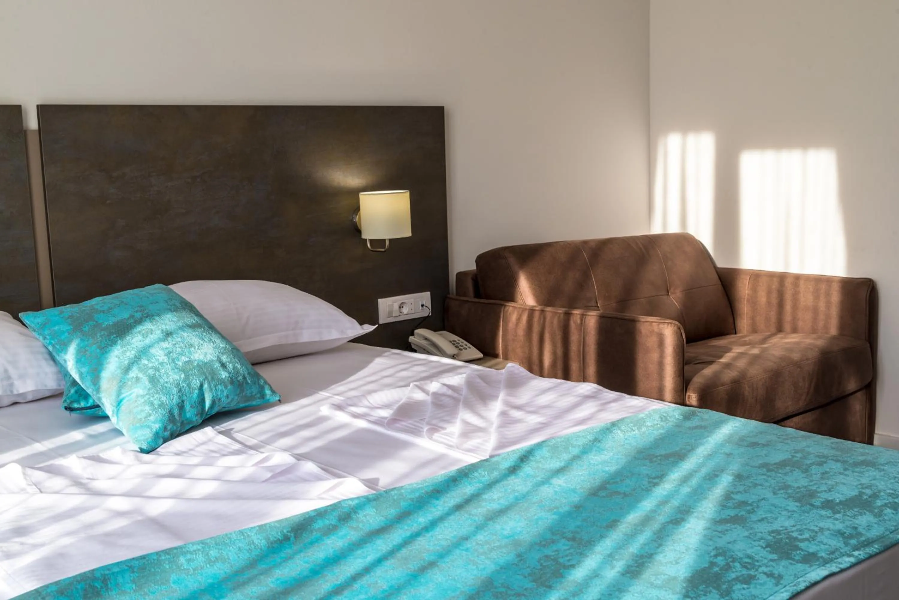Bed in B&B Amfora