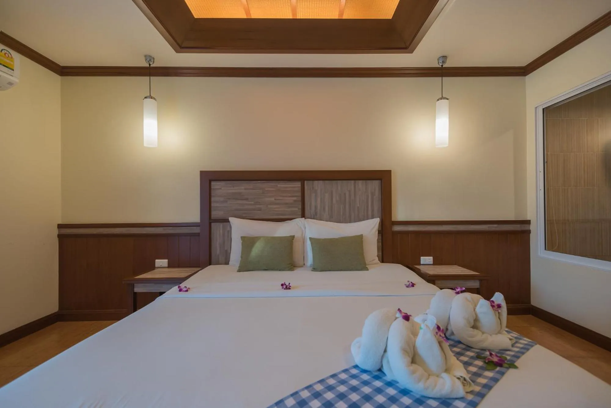 Bed in Mac Resort Hotel