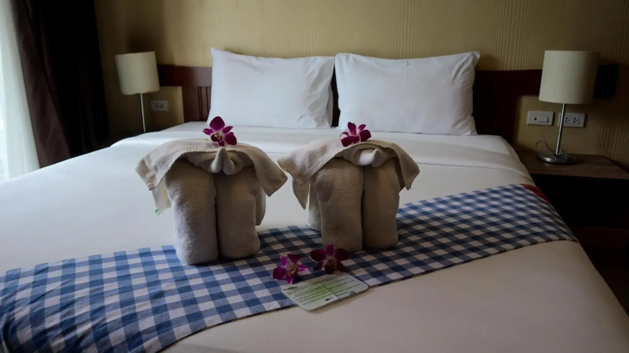 Bed in Mac Resort Hotel Bed in Mac Resort Hotel