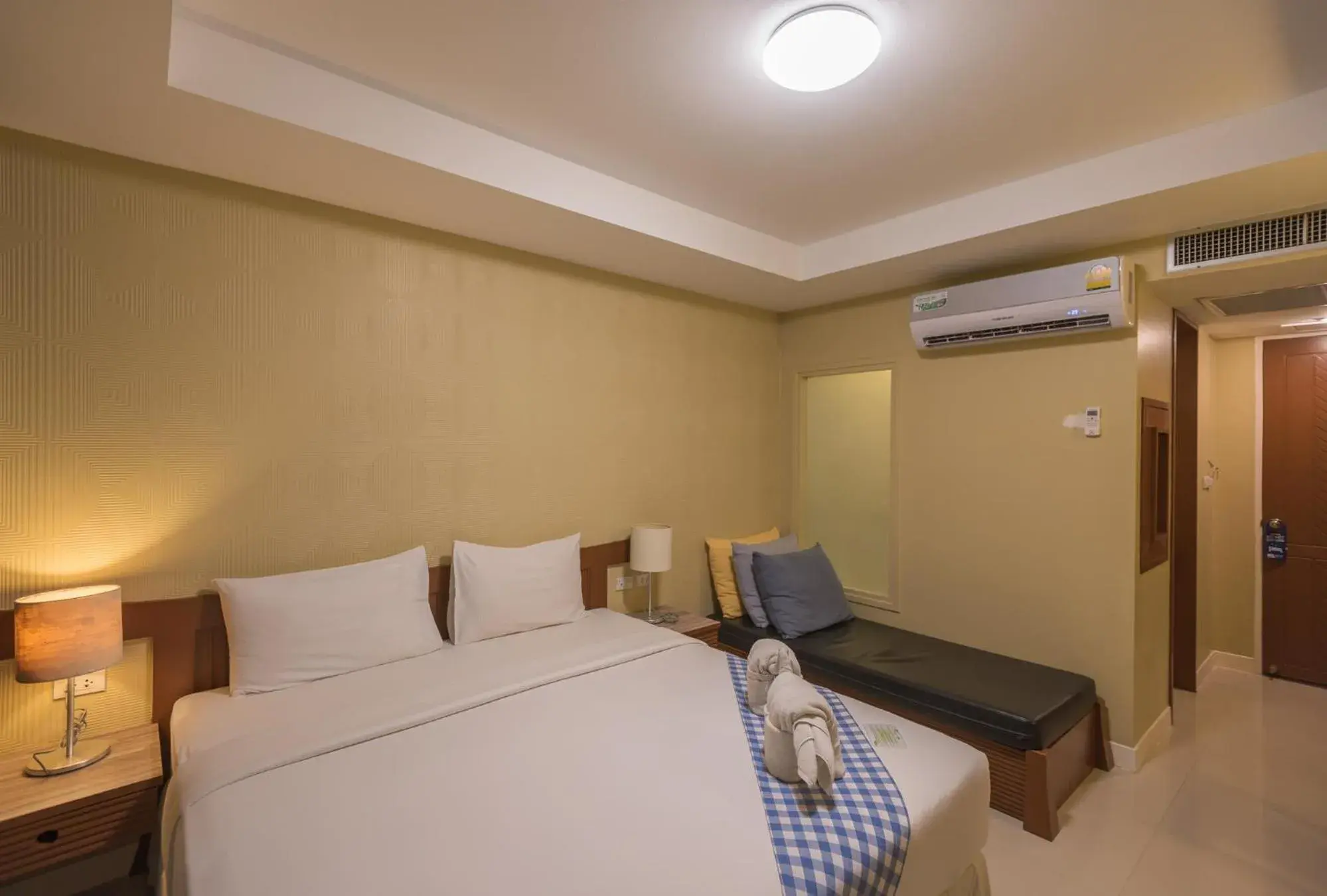 Bed in Mac Resort Hotel Bed in Mac Resort Hotel