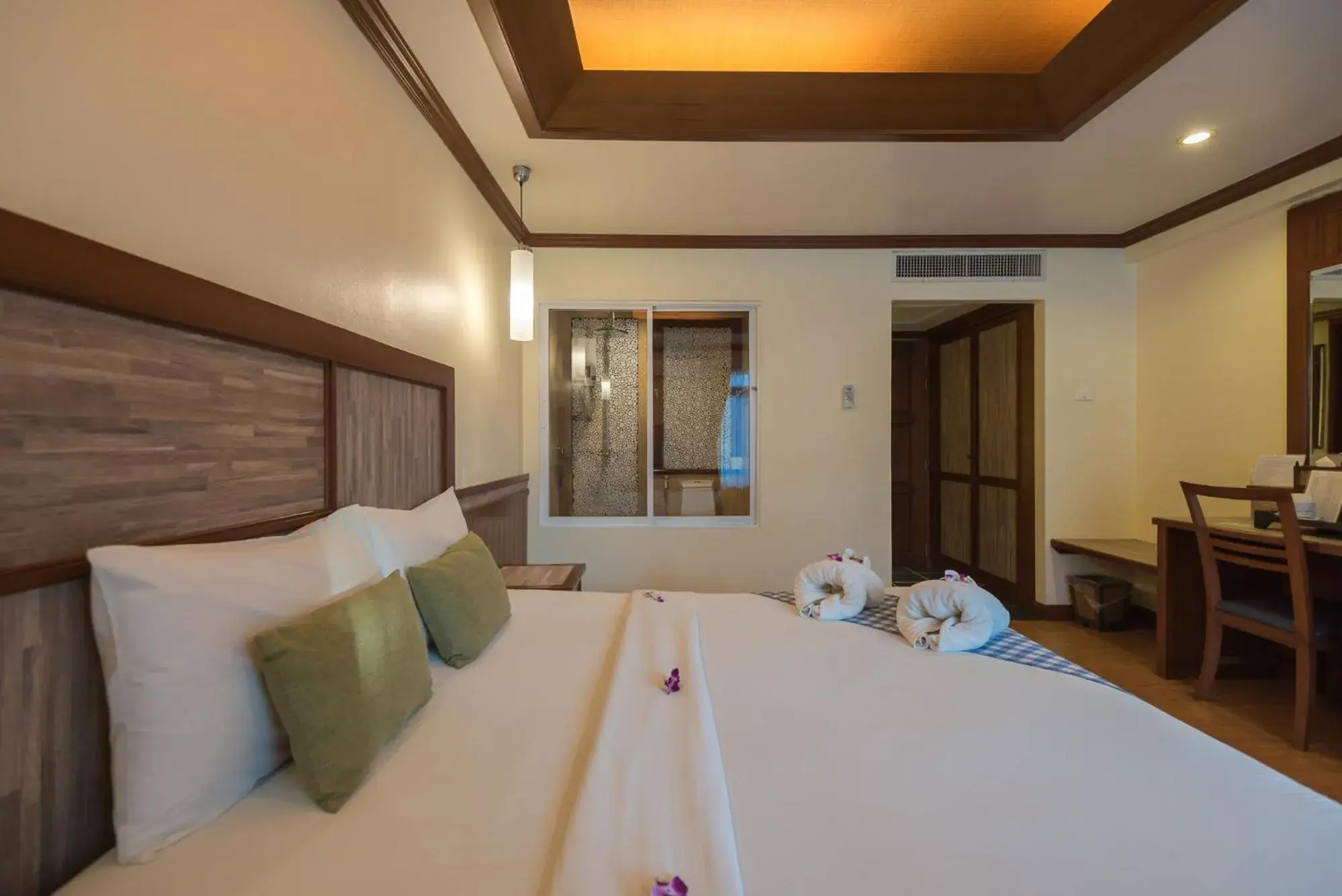 Bed in Mac Resort Hotel Bed in Mac Resort Hotel