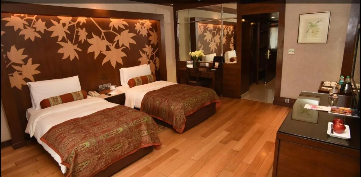 Bed in The LaLit Grand Palace Srinagar