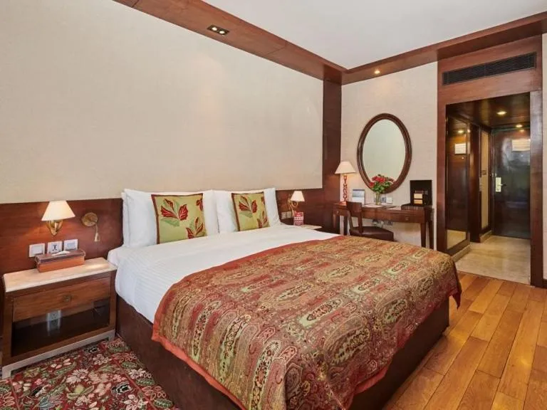 Bed in The LaLit Grand Palace Srinagar