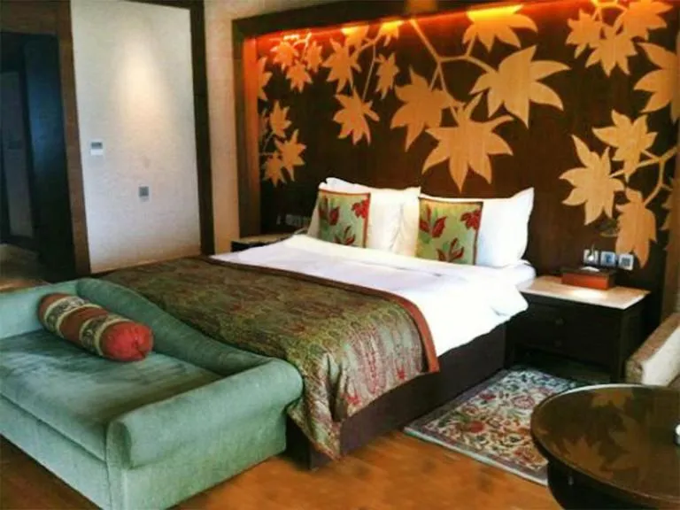 Bed in The LaLit Grand Palace Srinagar