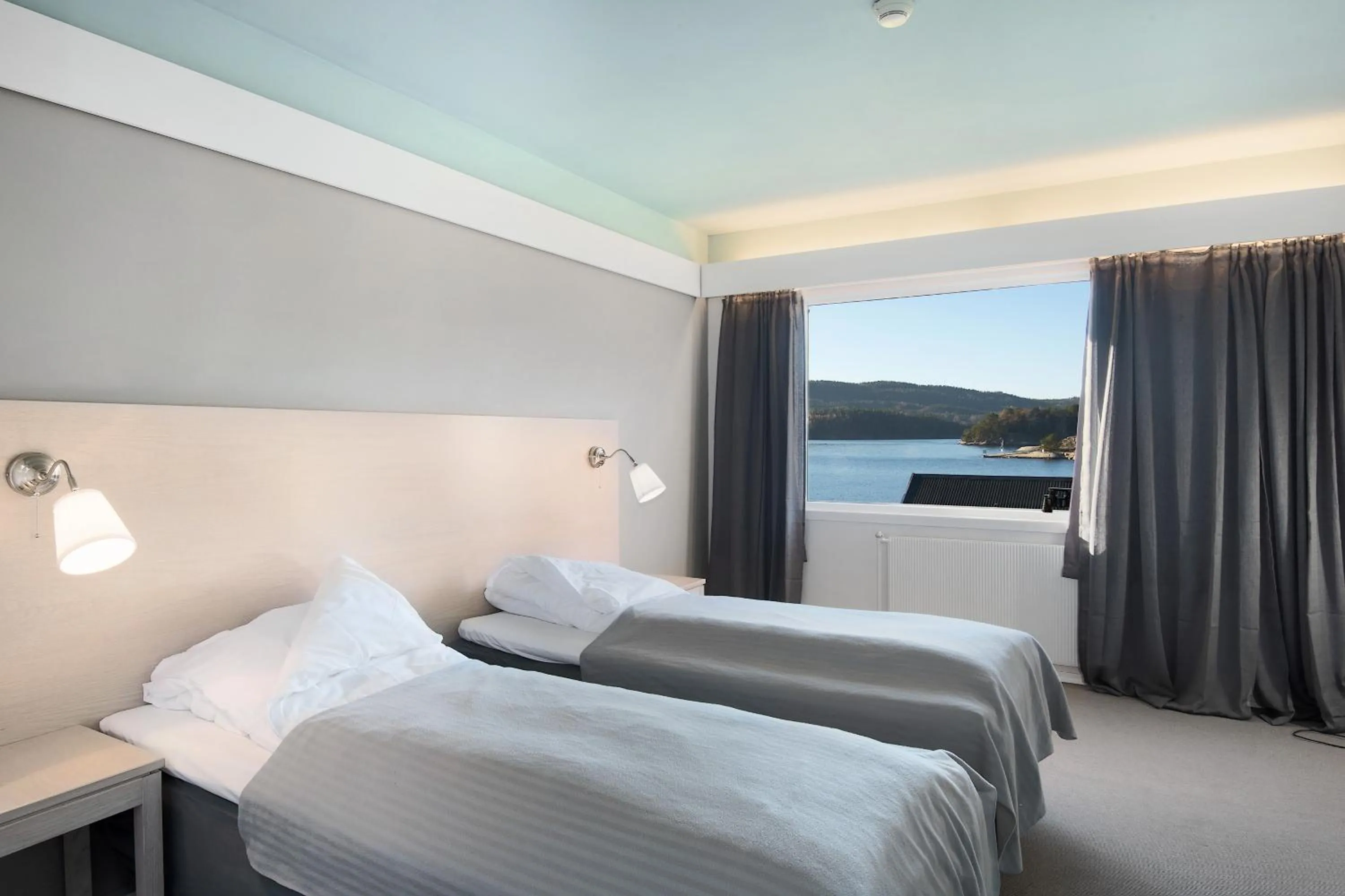 Bed in Oscarsborg Castle Hotel & Resort