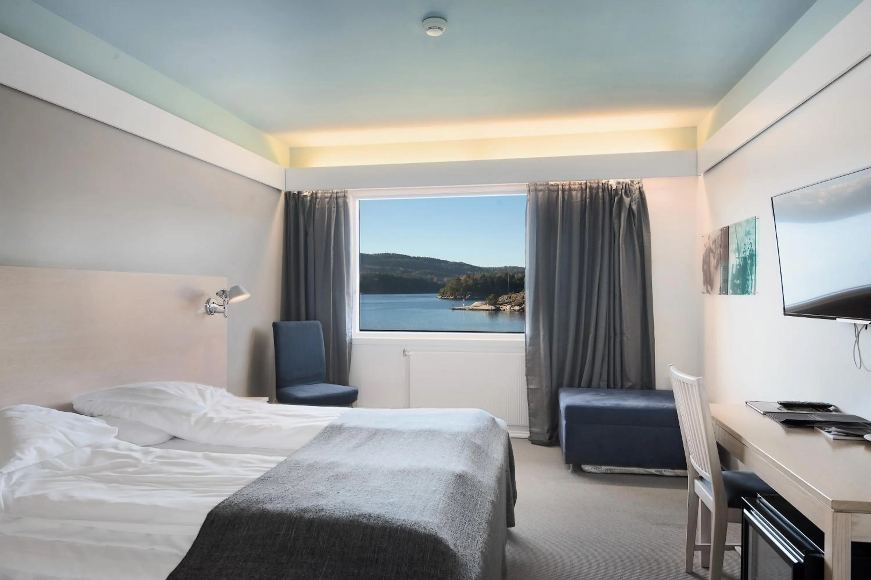 Bed in Oscarsborg Castle Hotel & Resort