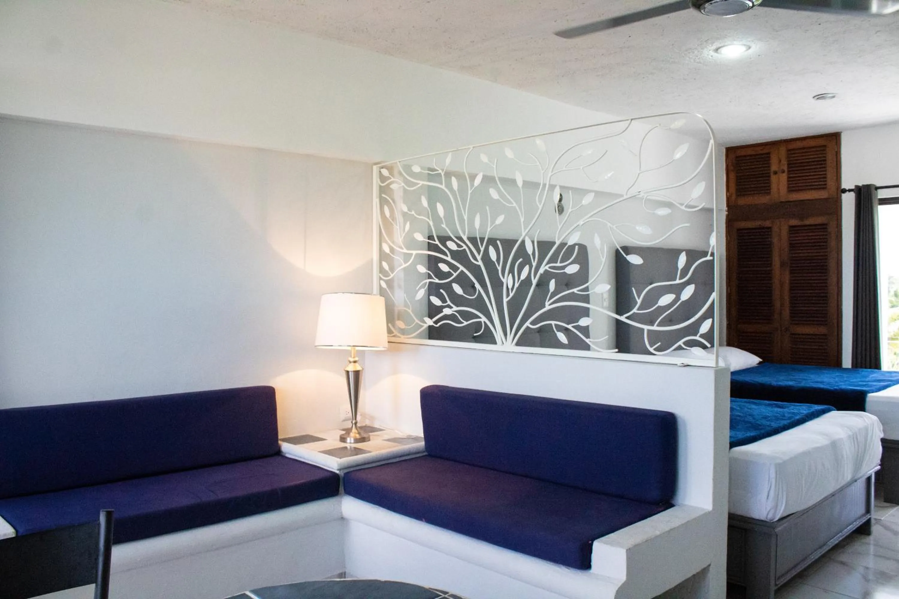 Living room, Bed in Hotel Pal Cozumel