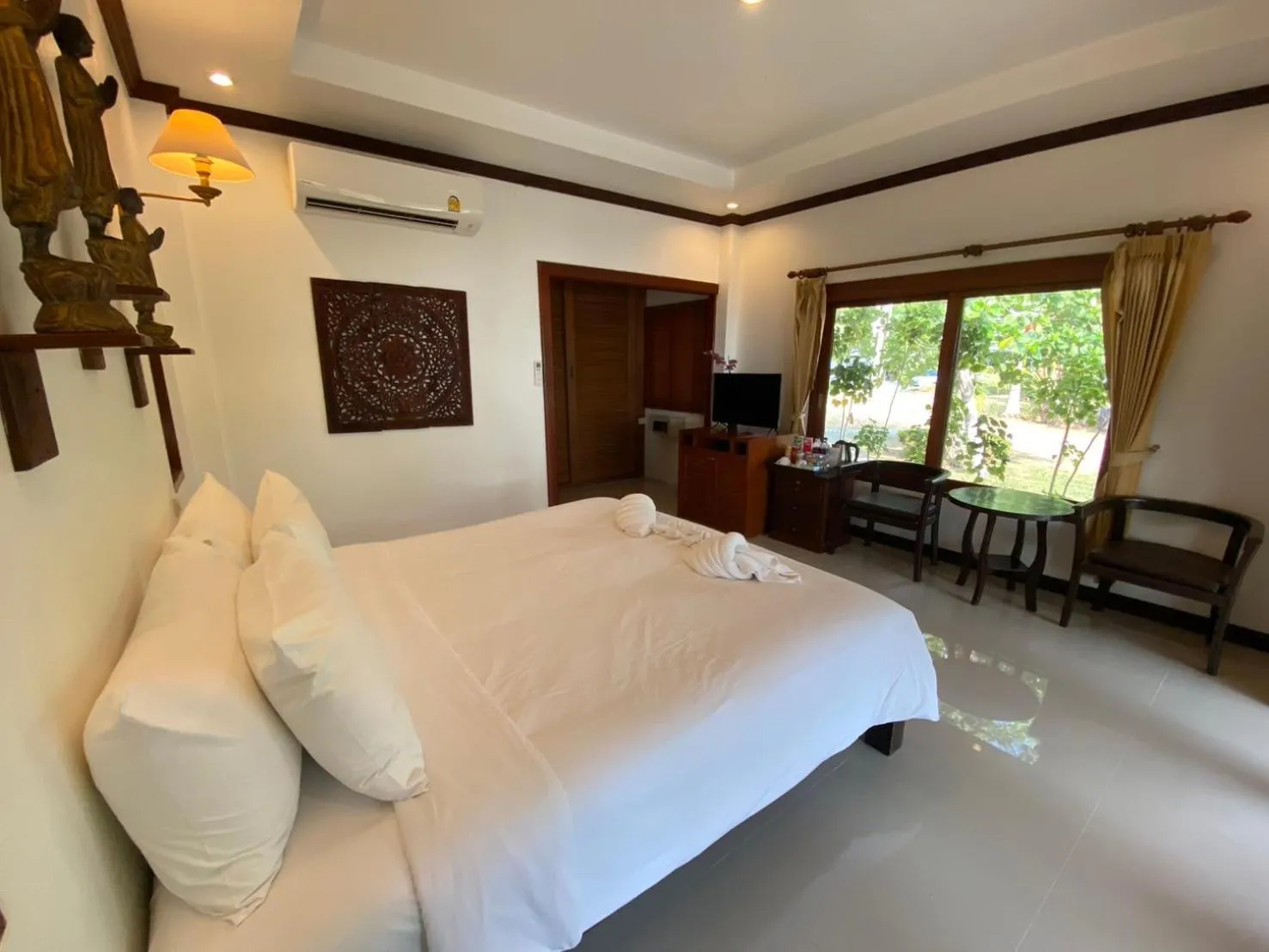 Bed in Am Samui Resort Taling Ngam