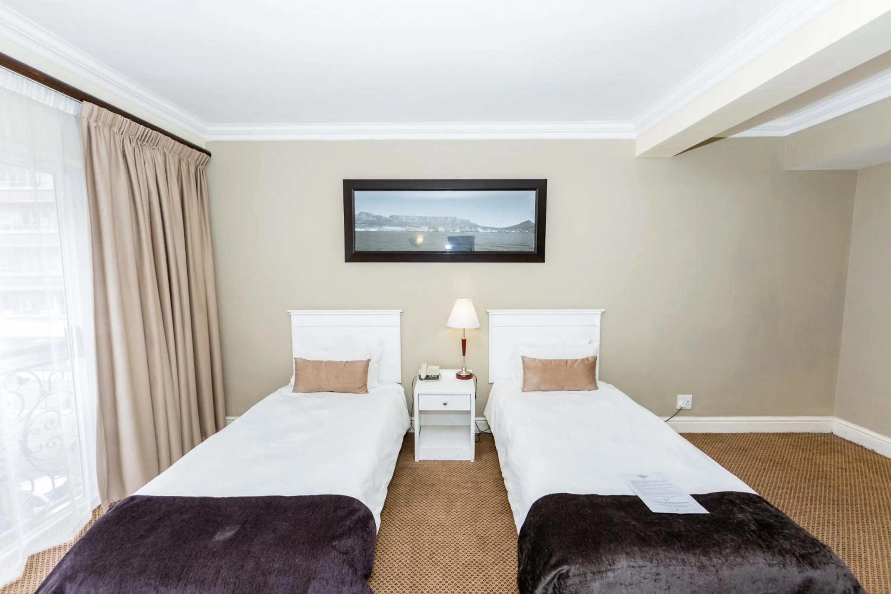 Bed in Innscape Classic Hotel